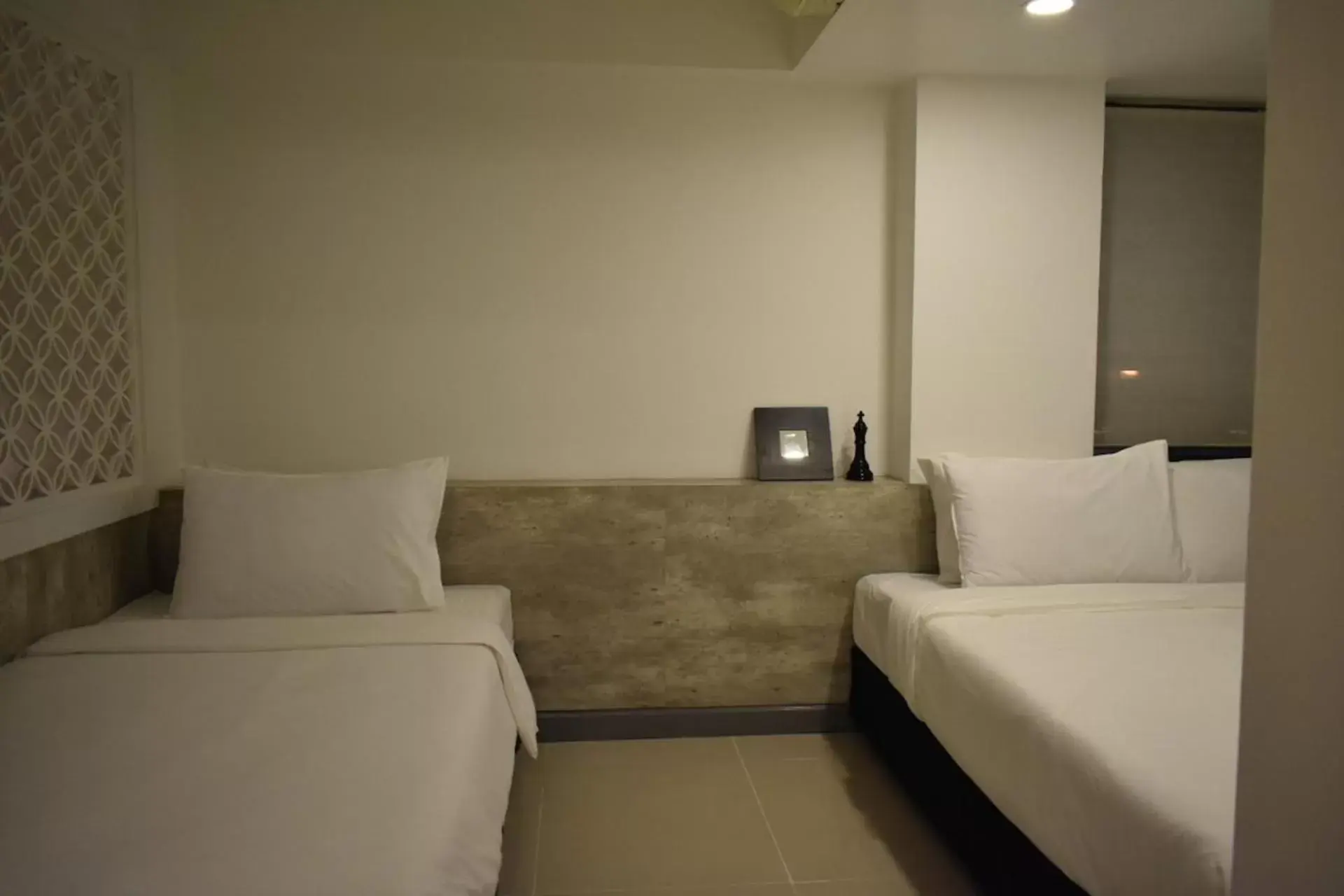 Bed in Loyy Hotel Bed in Loyy Hotel