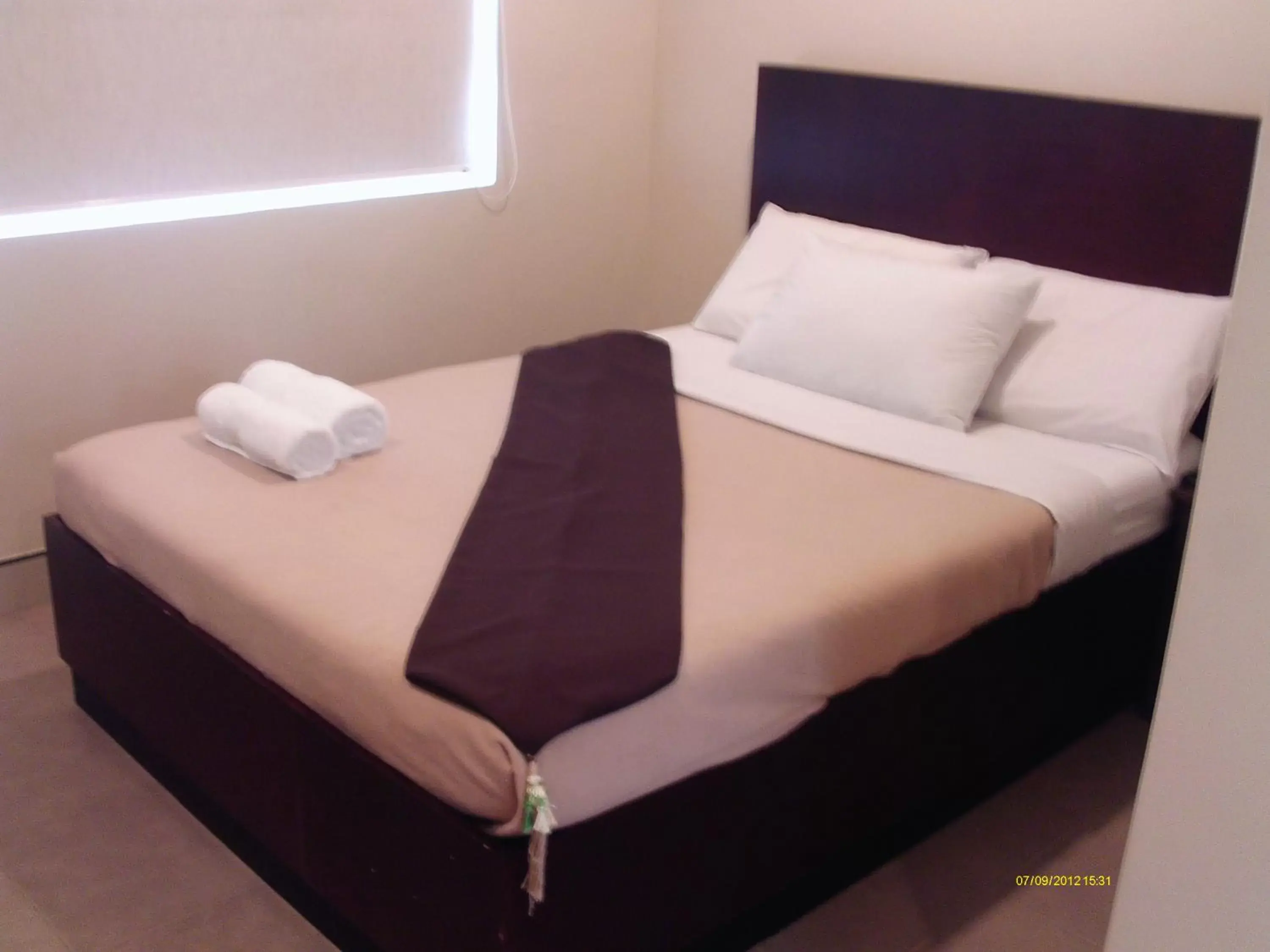 Bed in Grande Vista Hotel