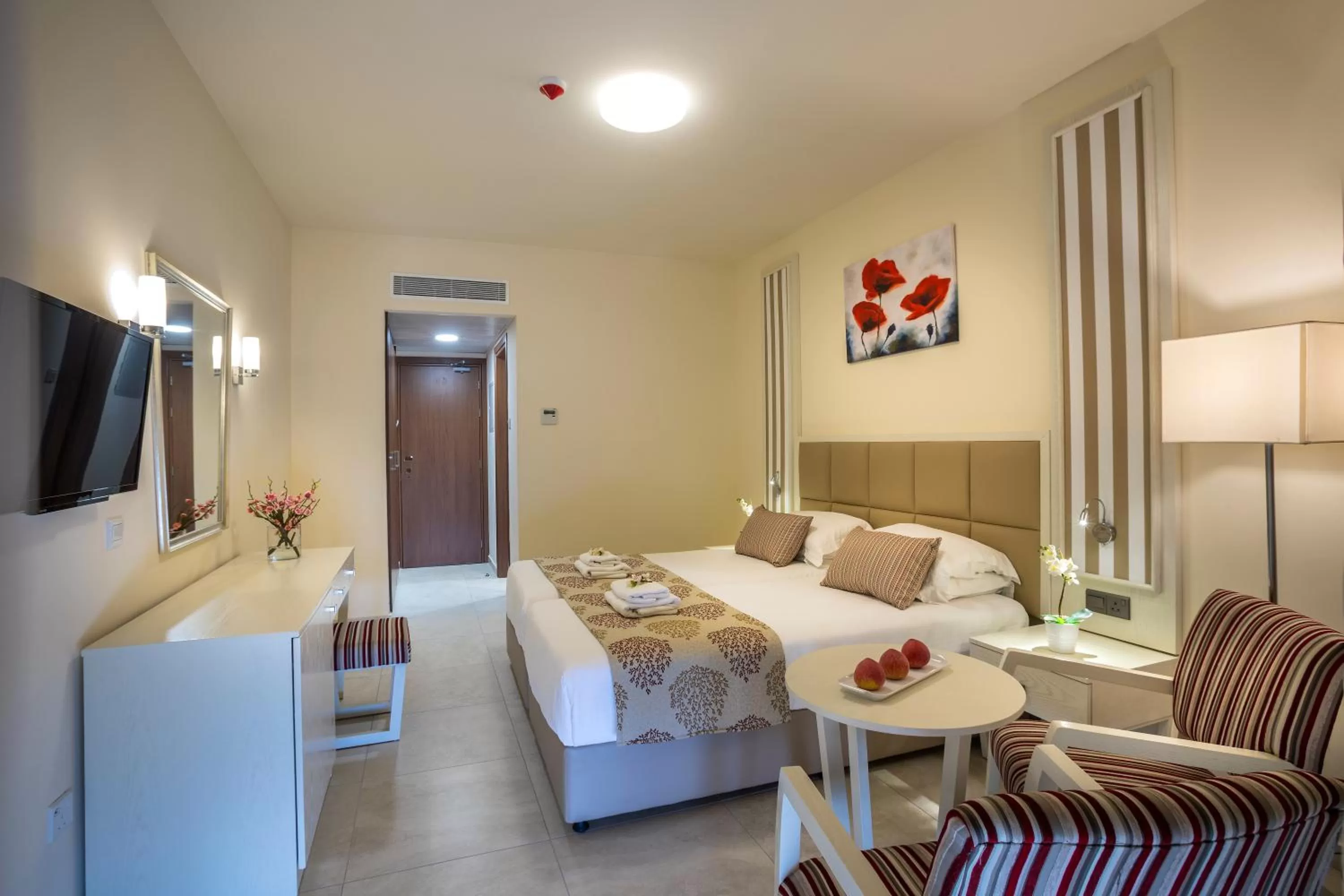 Photo of the whole room, Bed in Aquamare Beach Hotel & Spa