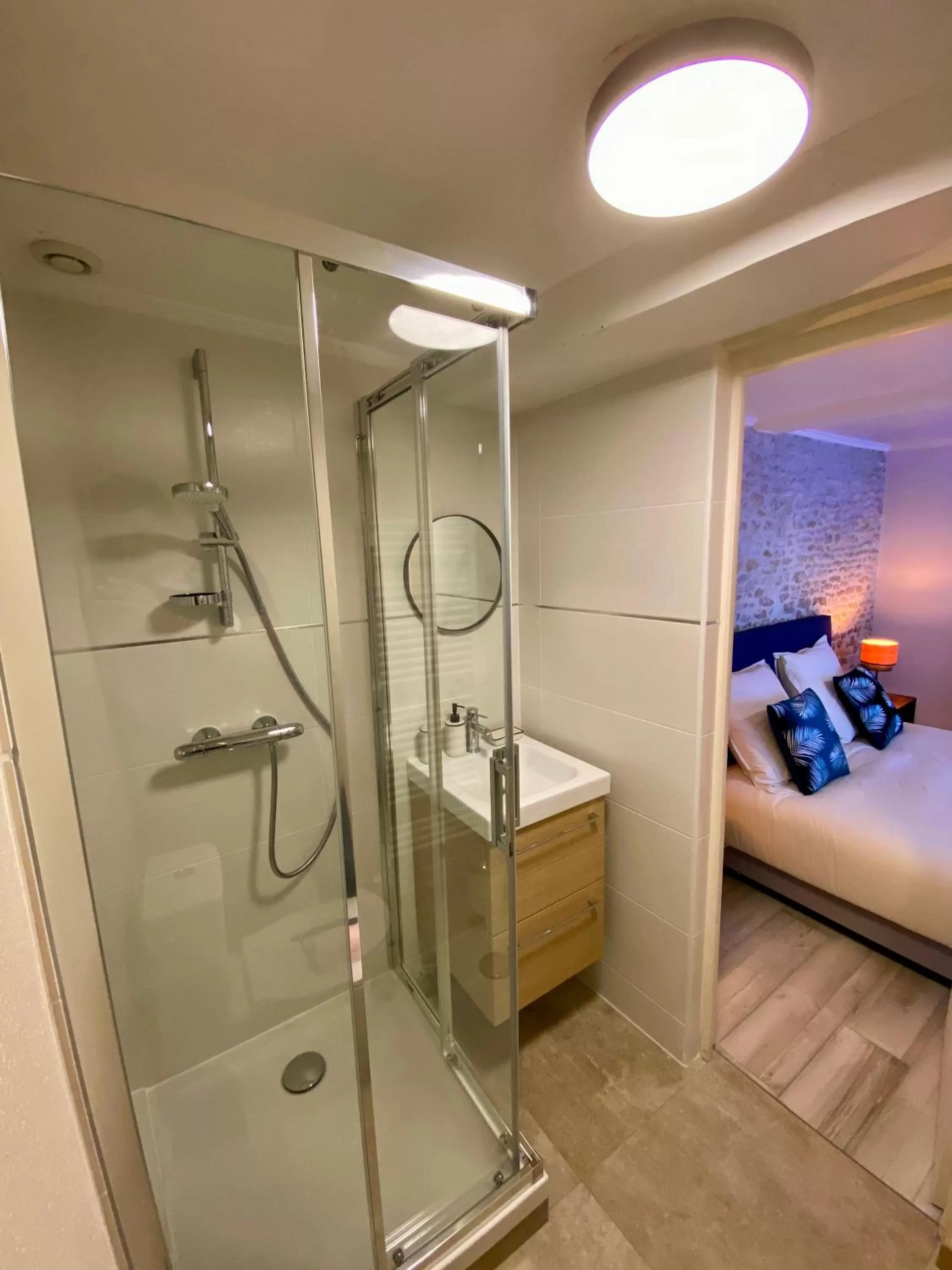 Bed in Chambres d'hôtes Le Maroni