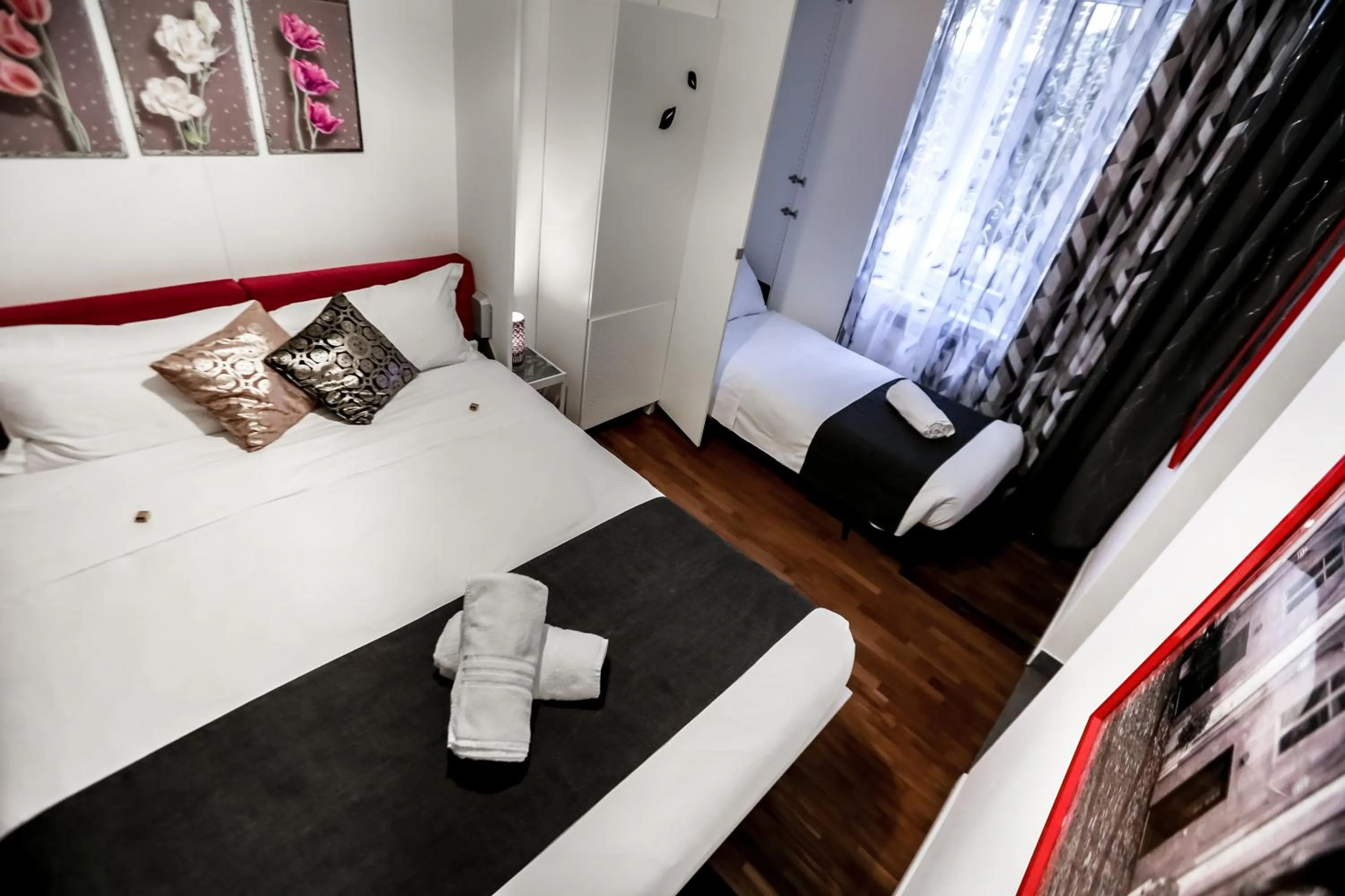 Photo of the whole room, Bed in Relais Circo Massimo