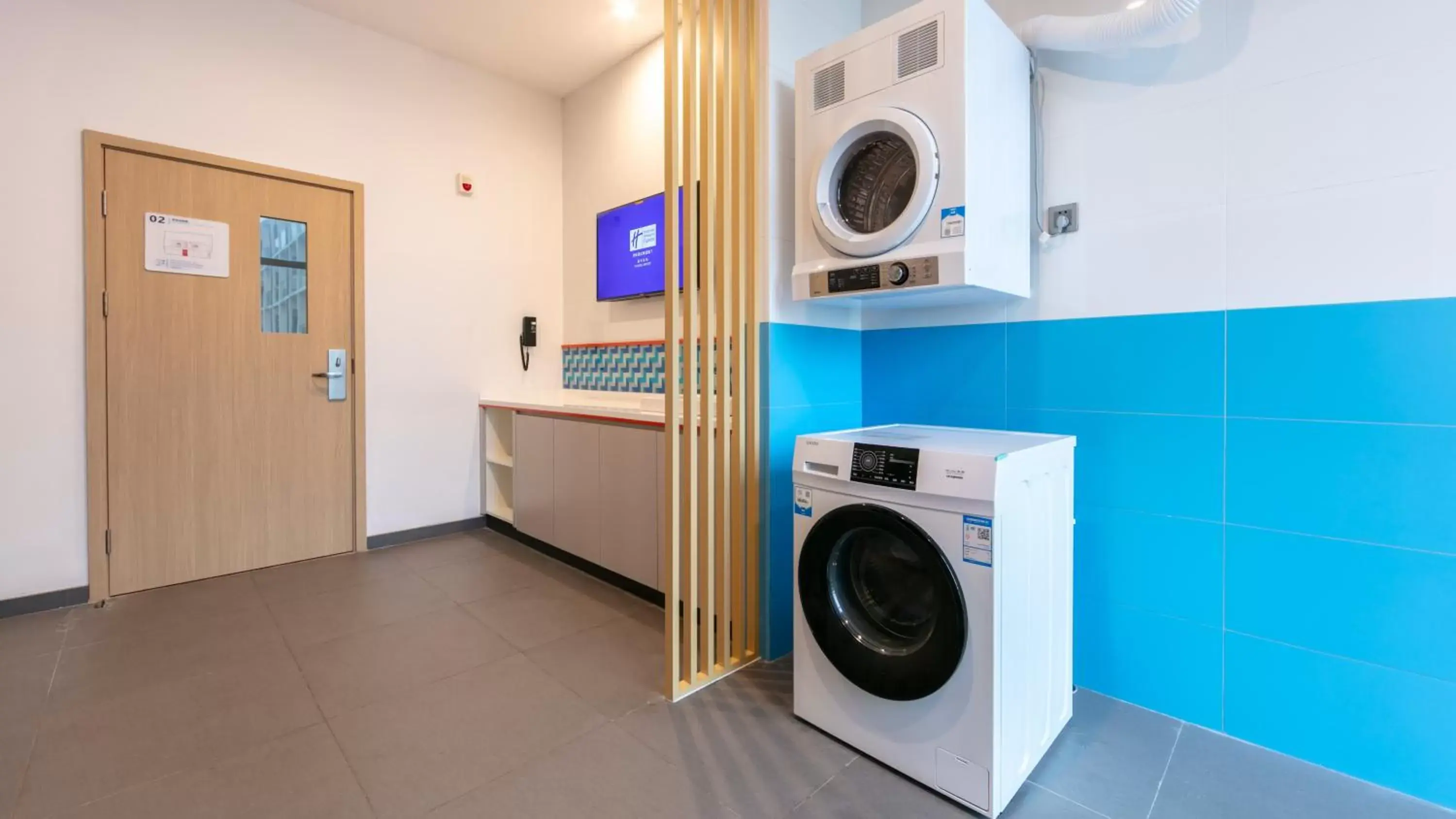 washing machine, Bathroom in Holiday Inn Express Shanghai Pudong Airport, an IHG Hotel