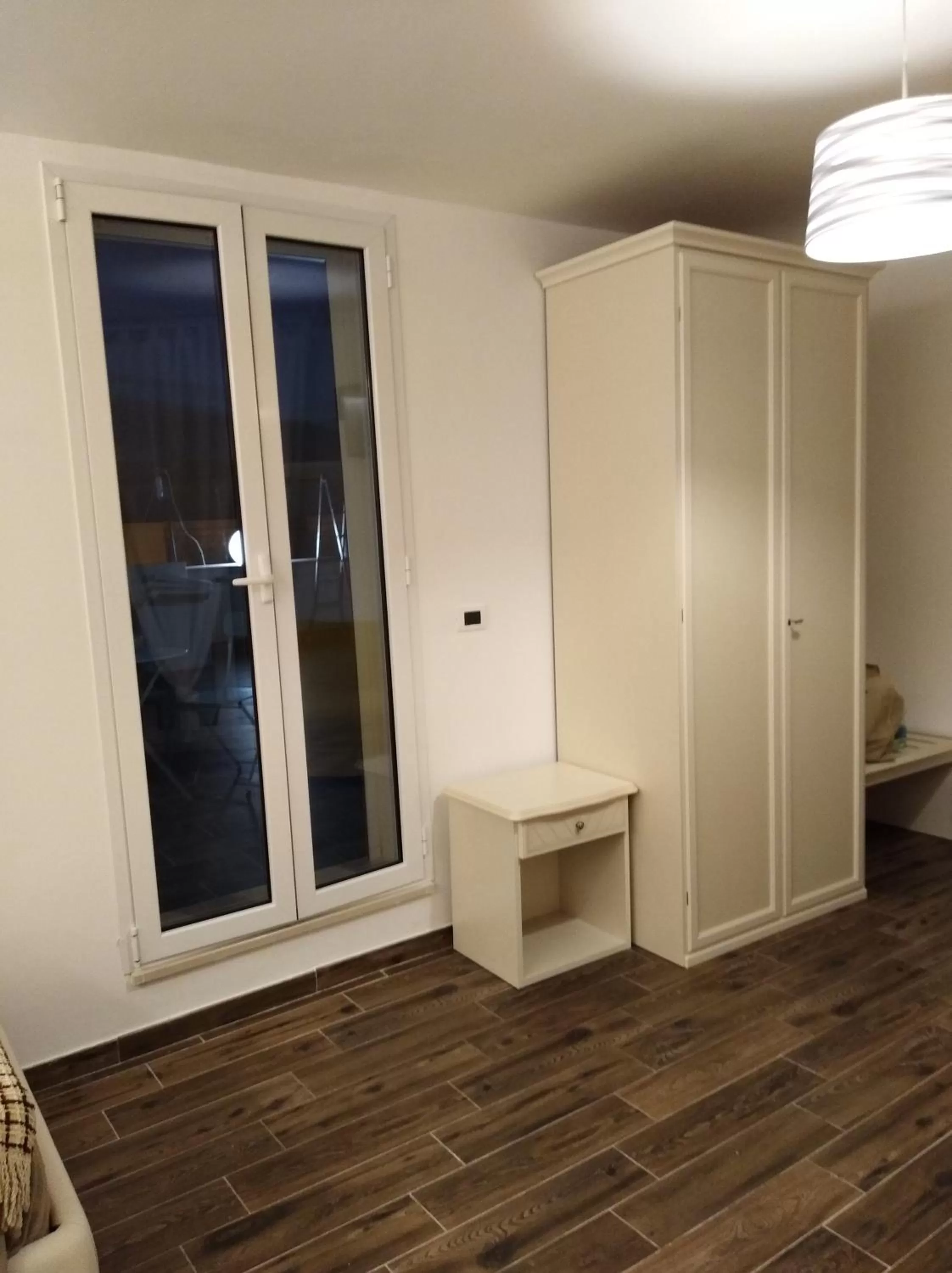 Photo of the whole room in DomuS al Corso B&B