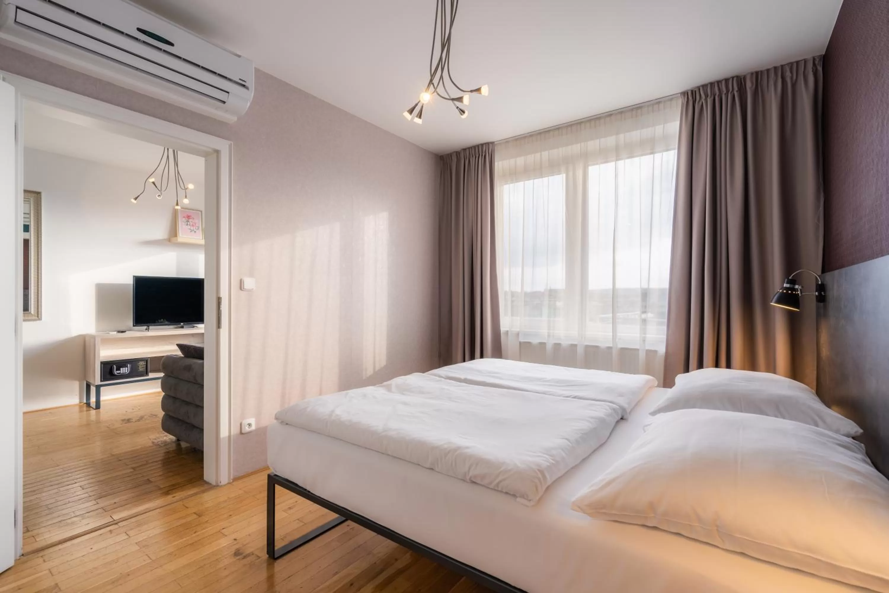 Bed in EA ApartHotel Melantrich