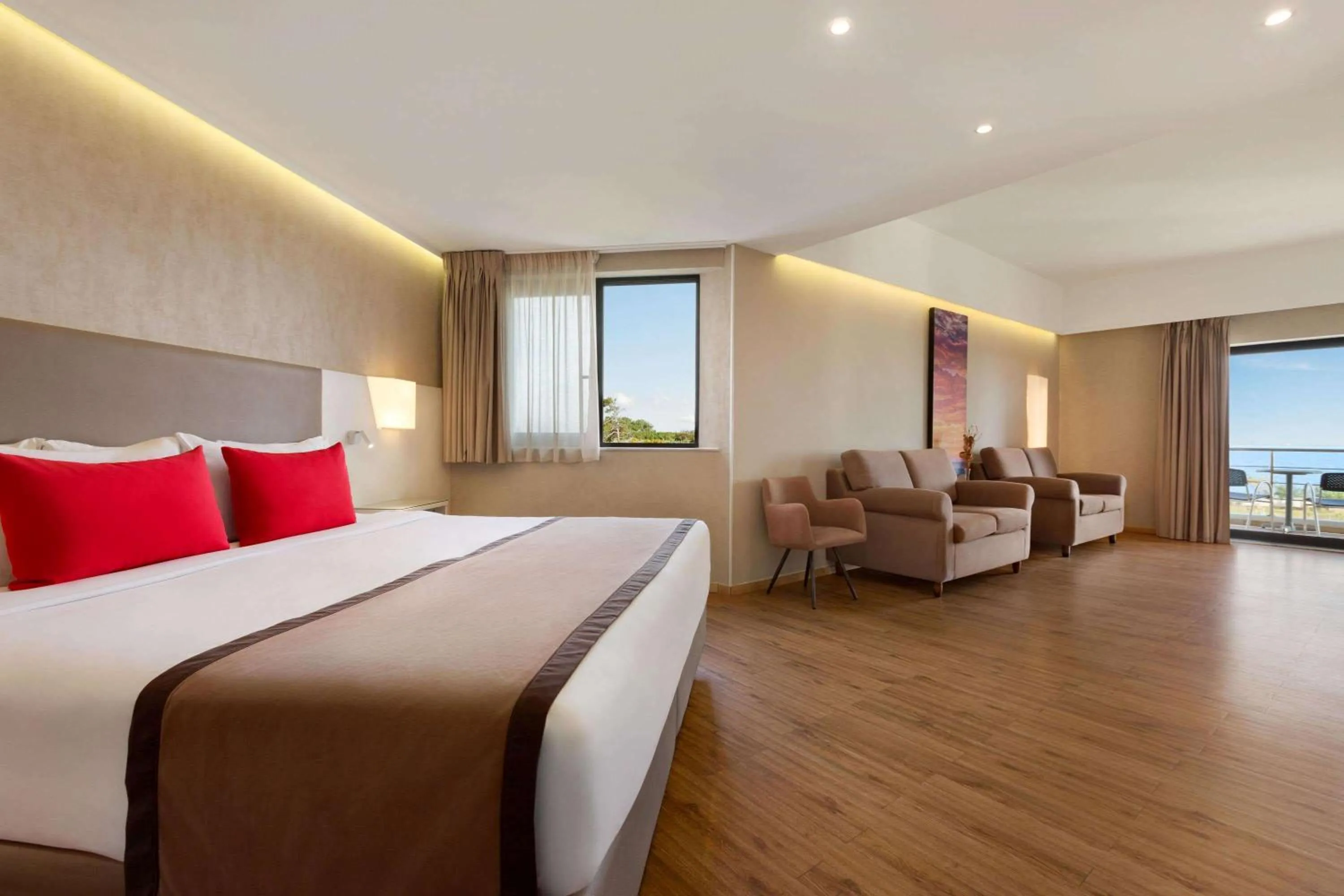 Photo of the whole room, Bed in Ramada Plaza by Wyndham Thraki