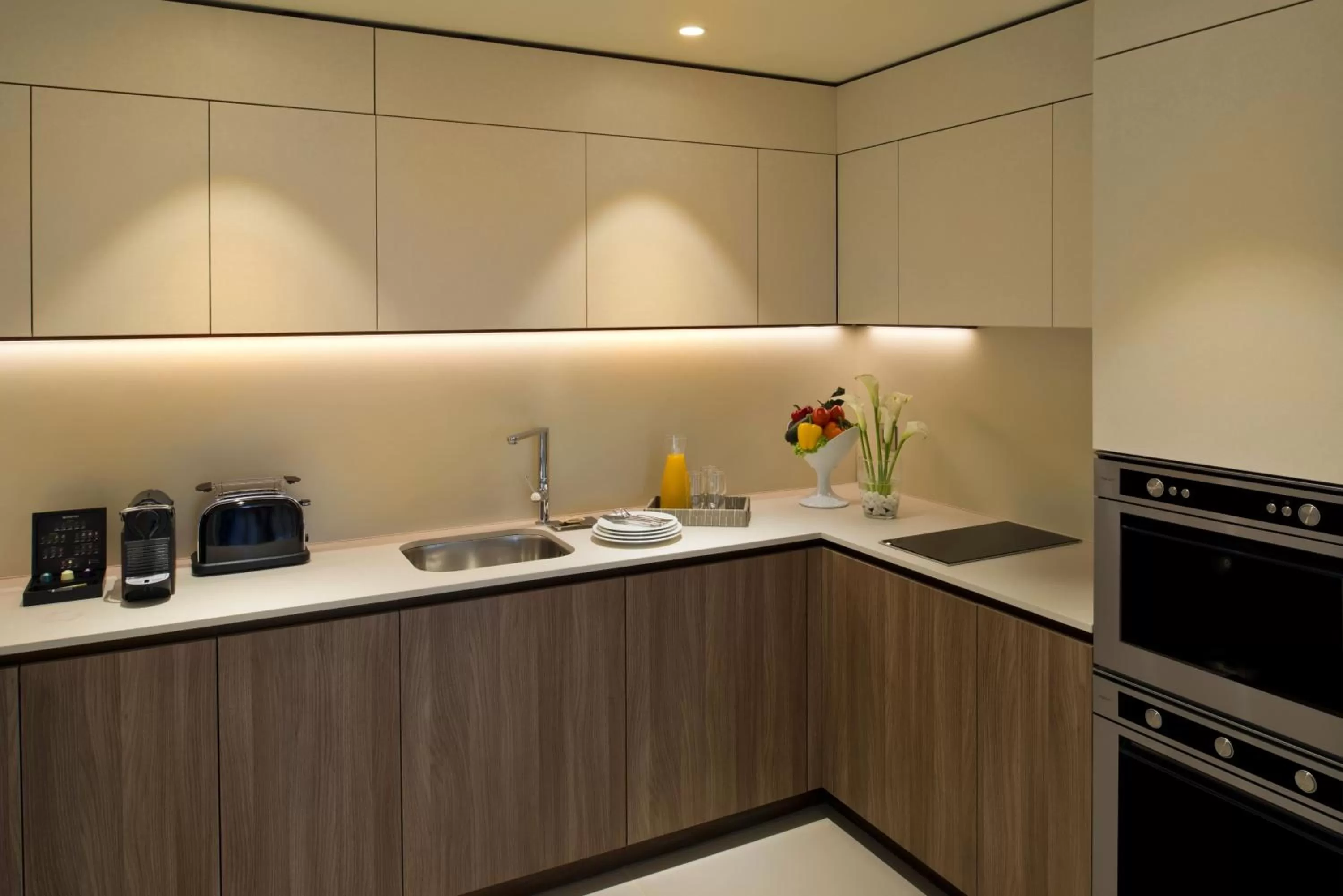 Kitchen or kitchenette in voco Doha West Bay Suites by IHG