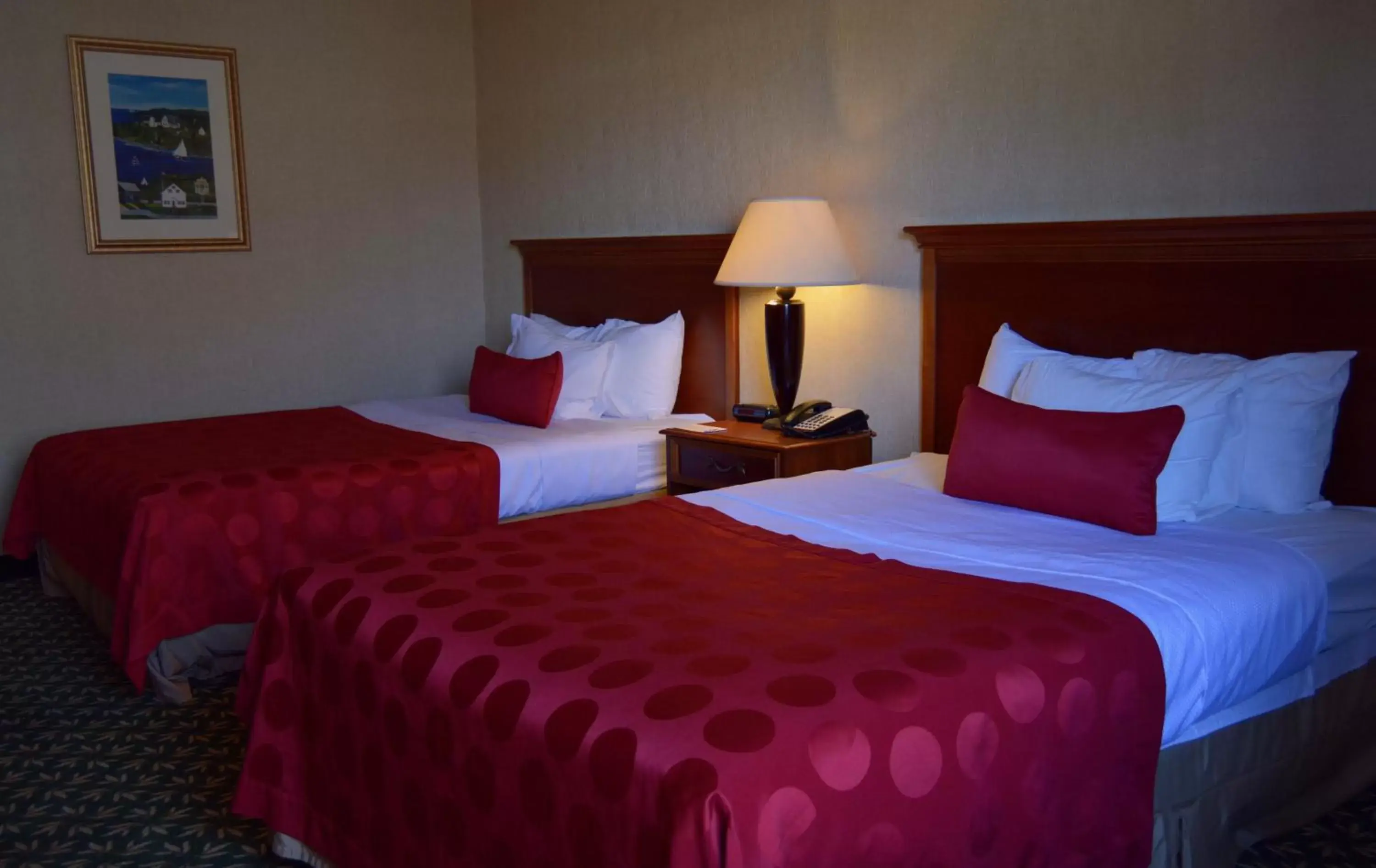 Bed in Mystic River Hotel & Suites