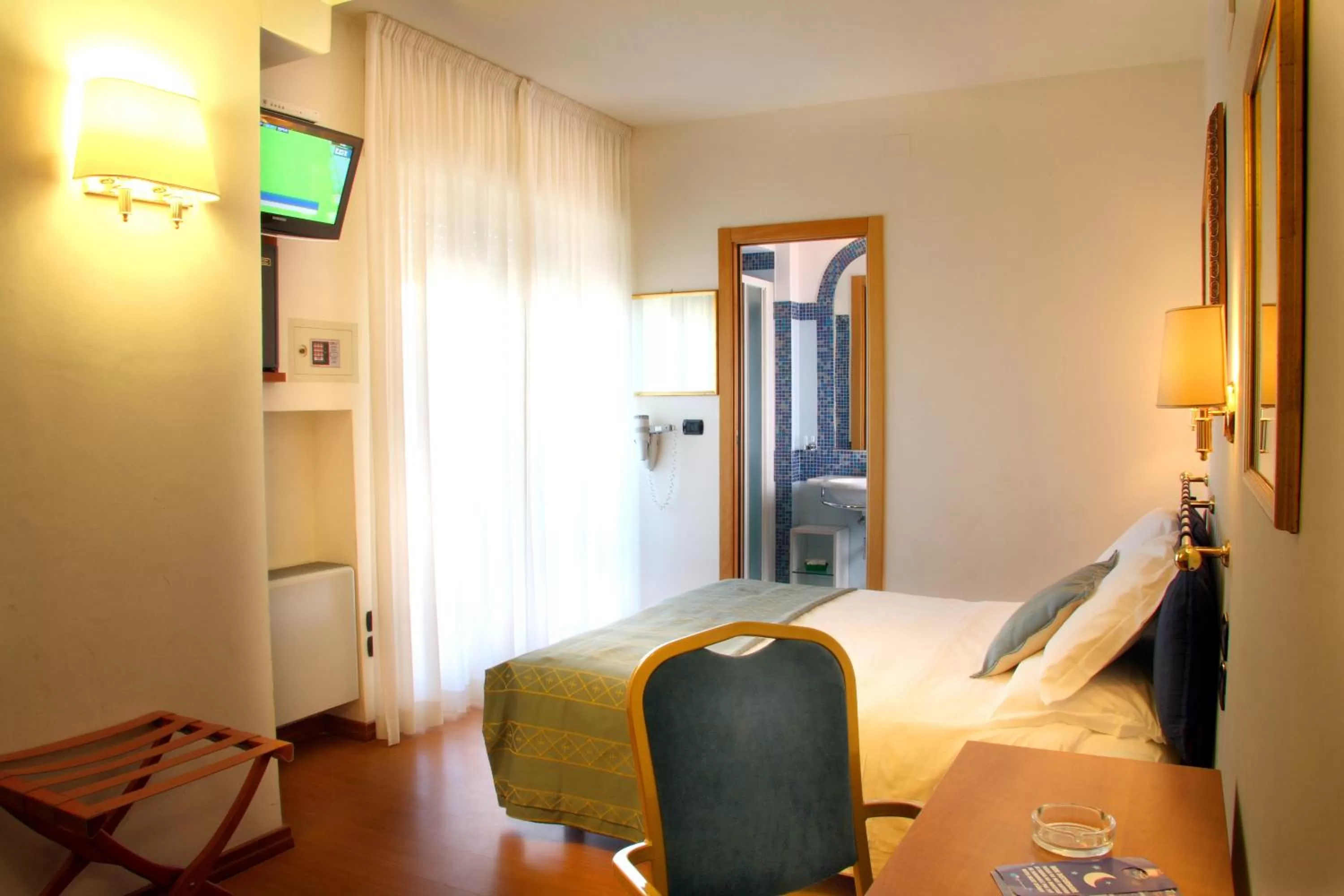 Photo of the whole room, Bed in Hotel International