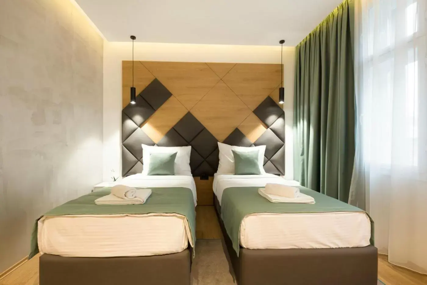 Bed in Capital Hotel Garni