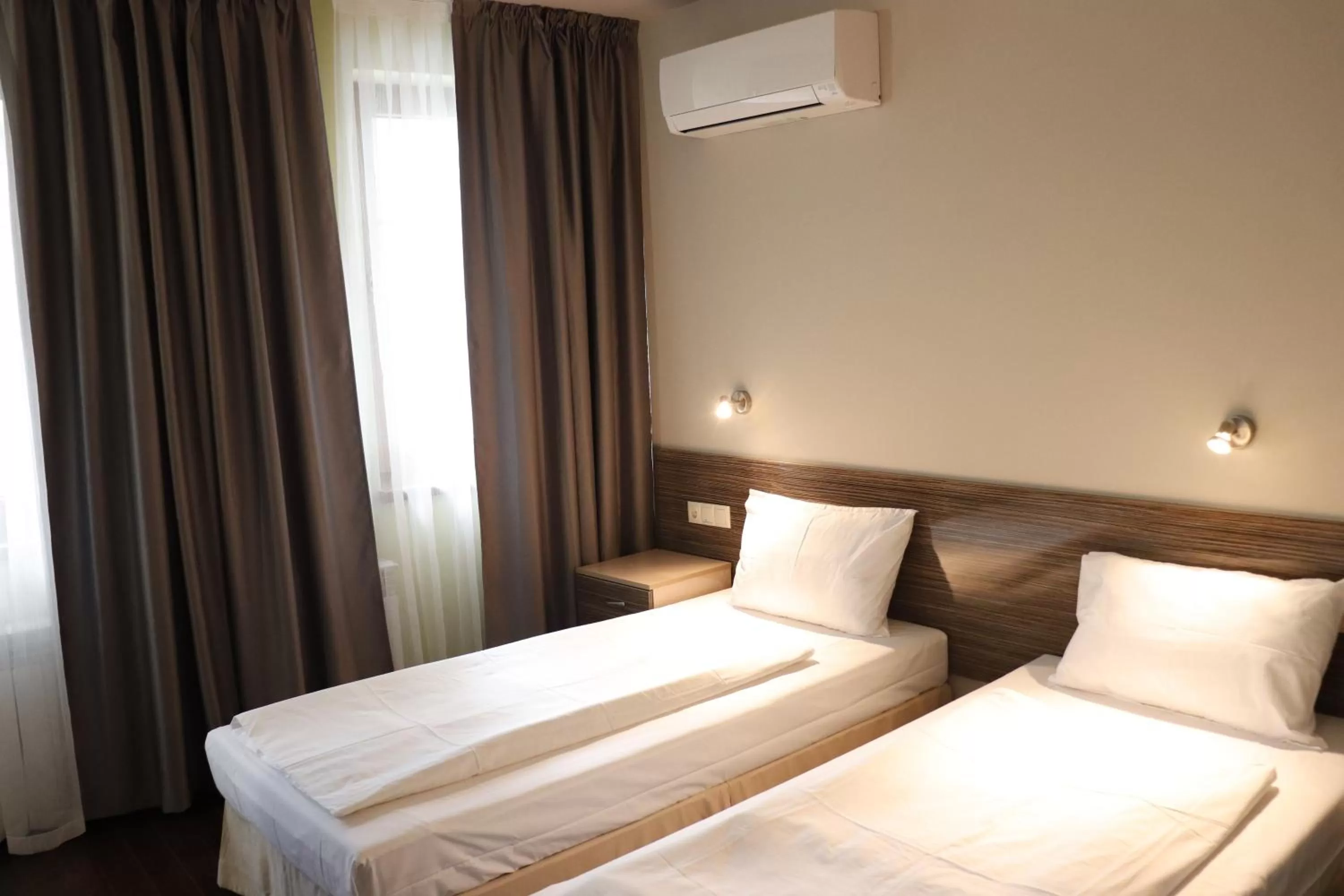 Bed in Roots Hotel and Wine Bar