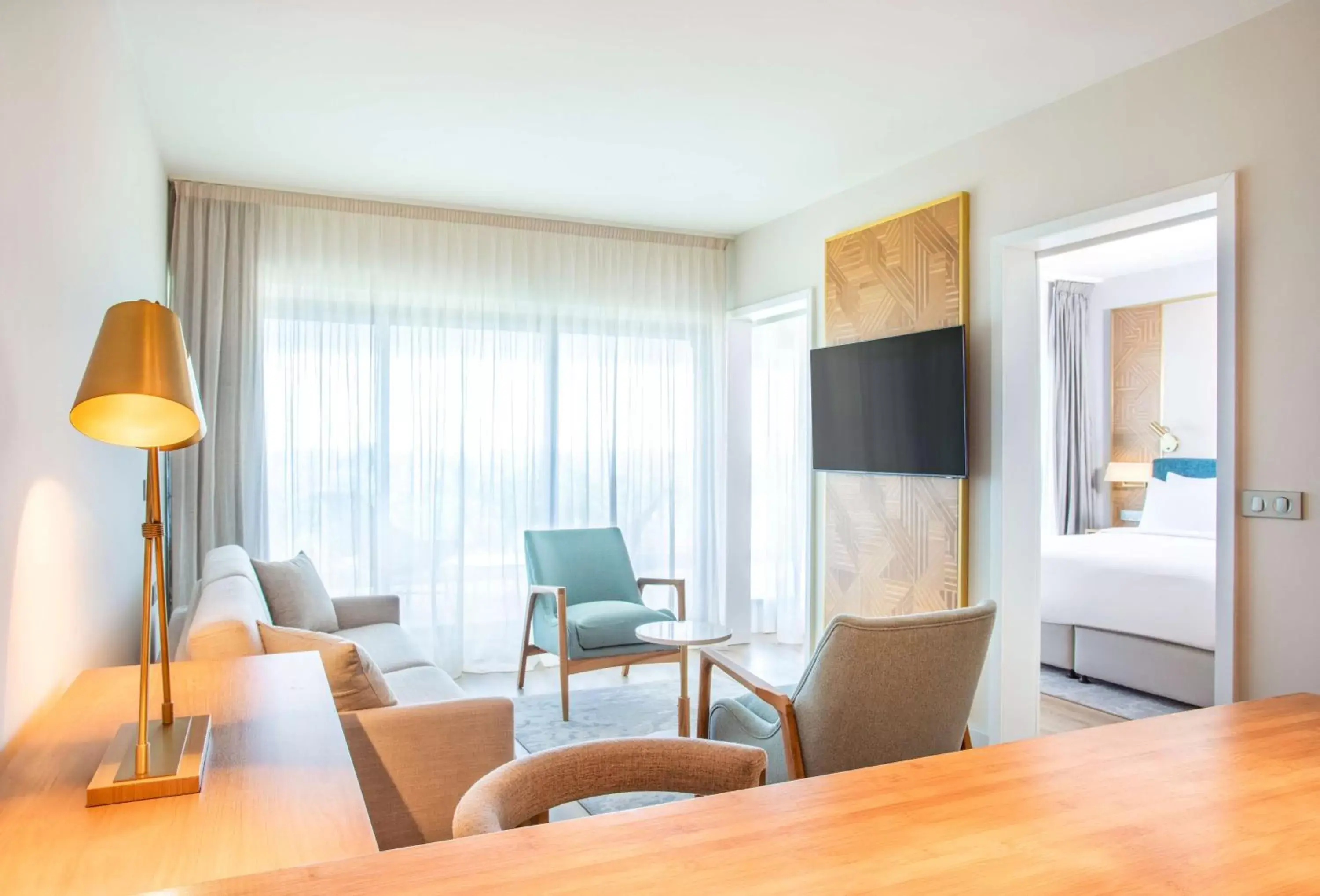 Photo of the whole room, Seating Area in Radisson Hotel Saint Denis, La Reunion