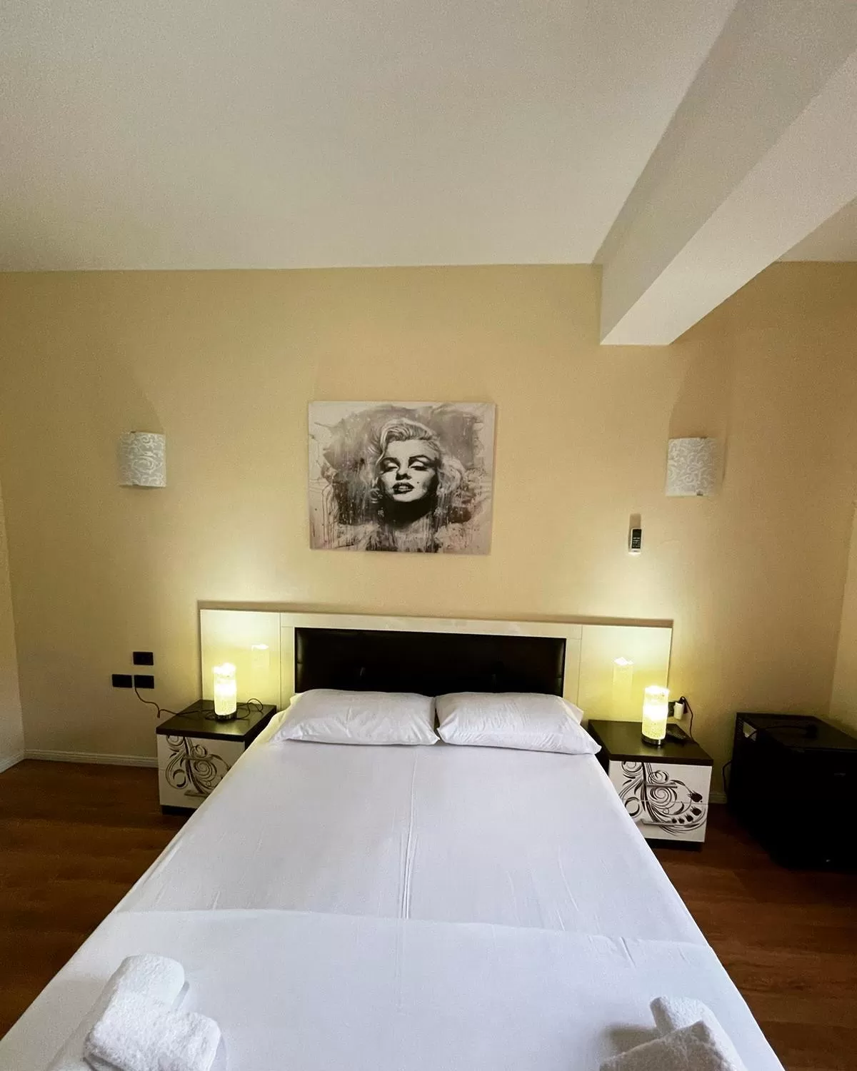 Bed in Hotel Ambasador Garden