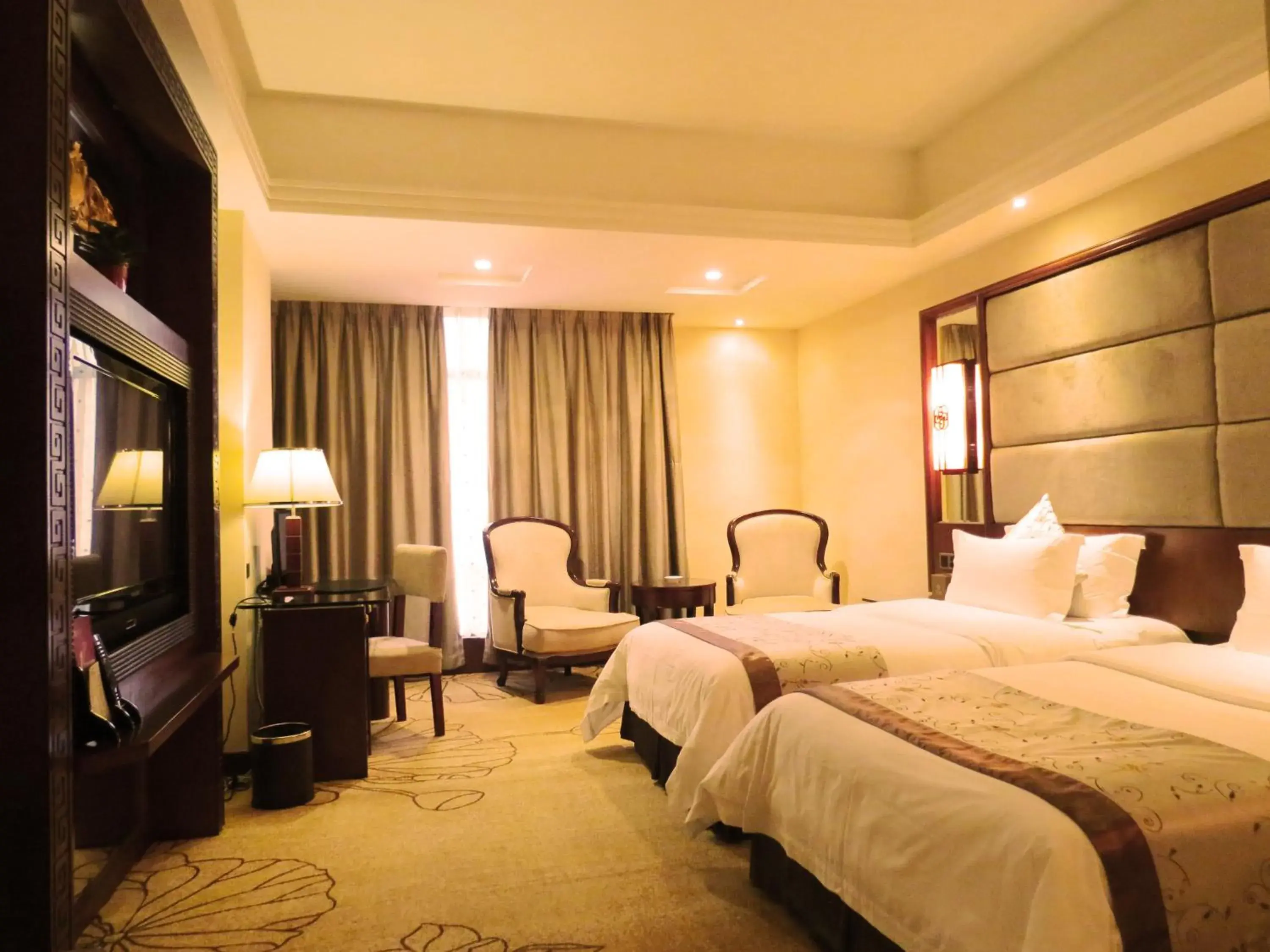 Bed in Rongjiang Hotel