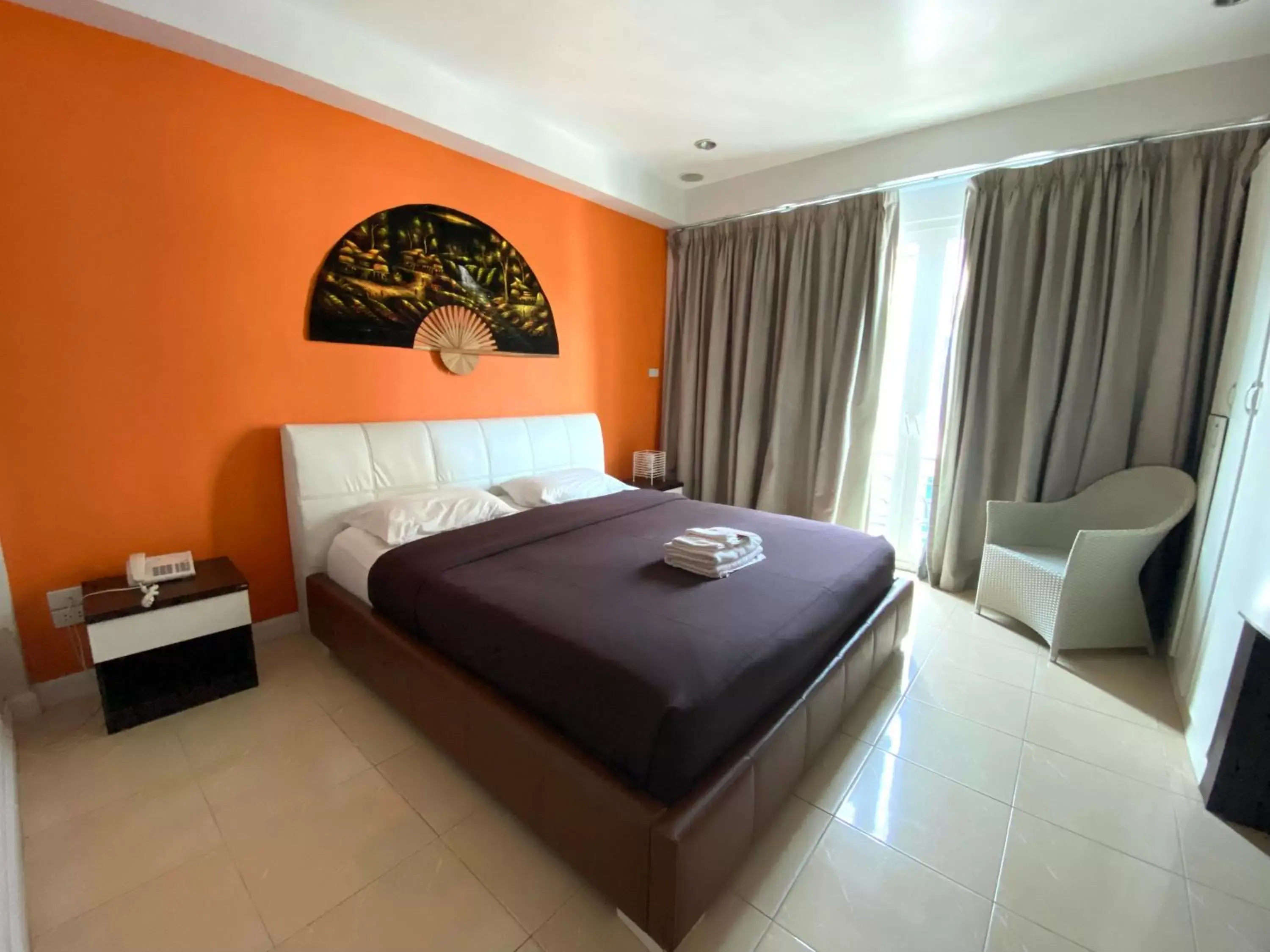 Bed in Access Inn Pattaya