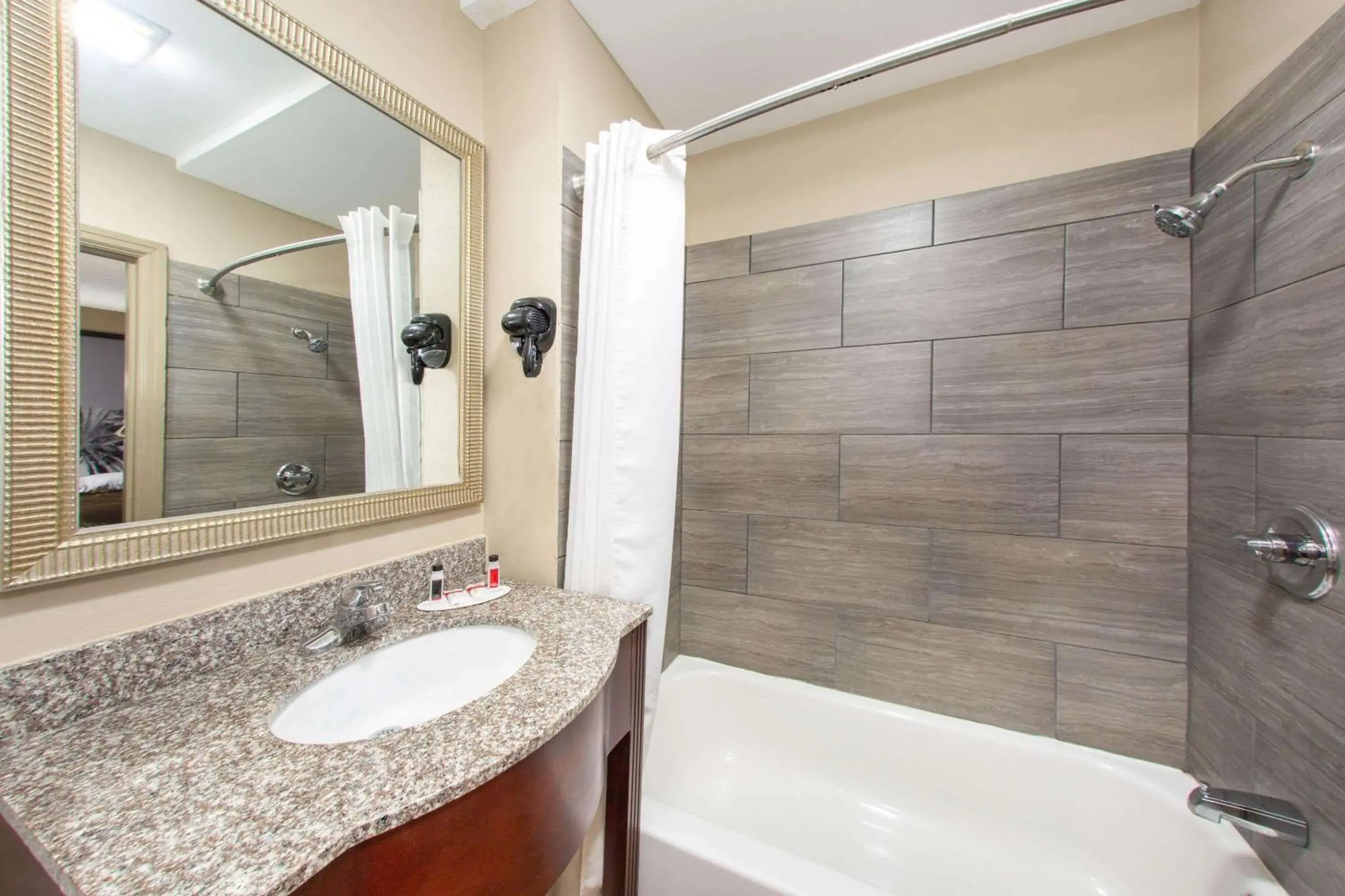 Bathroom in Super 8 by Wyndham Pensacola NAS Area