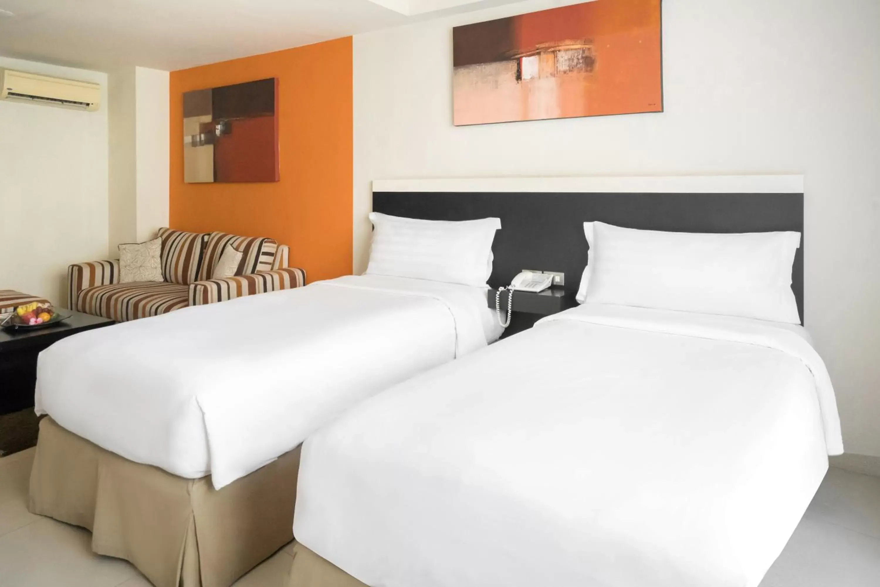 Bed in ASTON Denpasar Hotel & Convention