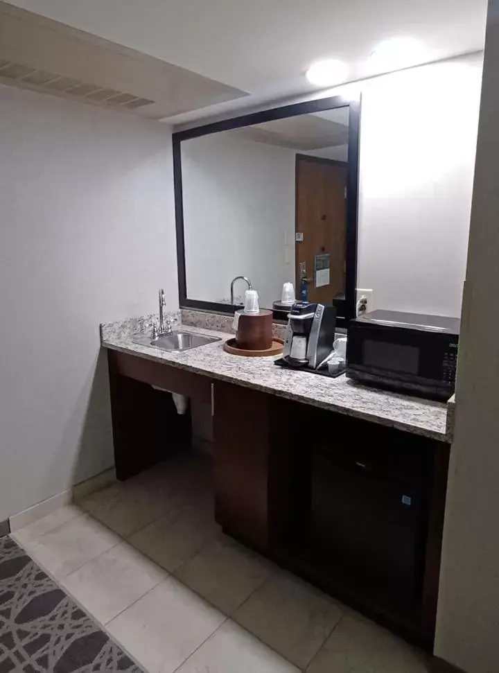 Kitchen or kitchenette, Bathroom in Holiday Inn - McAllen - Medical Center Area, an IHG Hotel