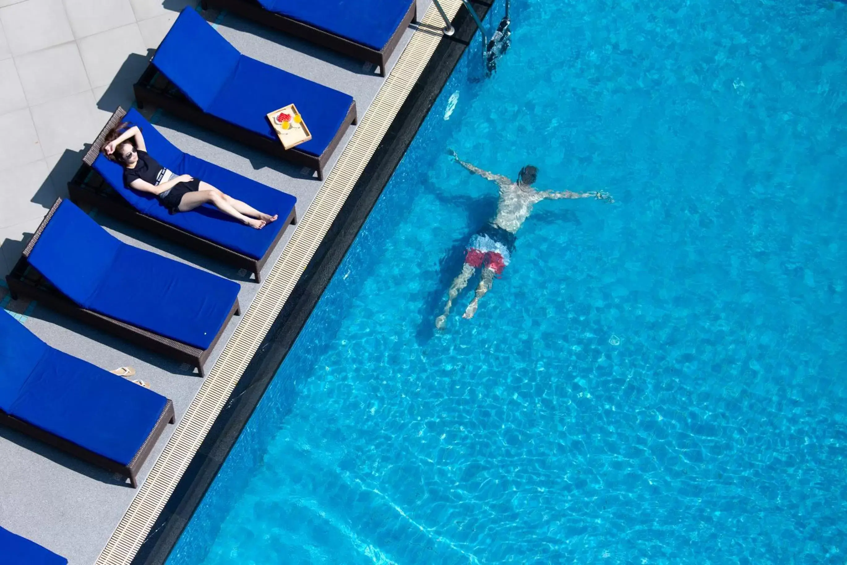 People, Swimming Pool in Lasalle Suites Hotel & Residence