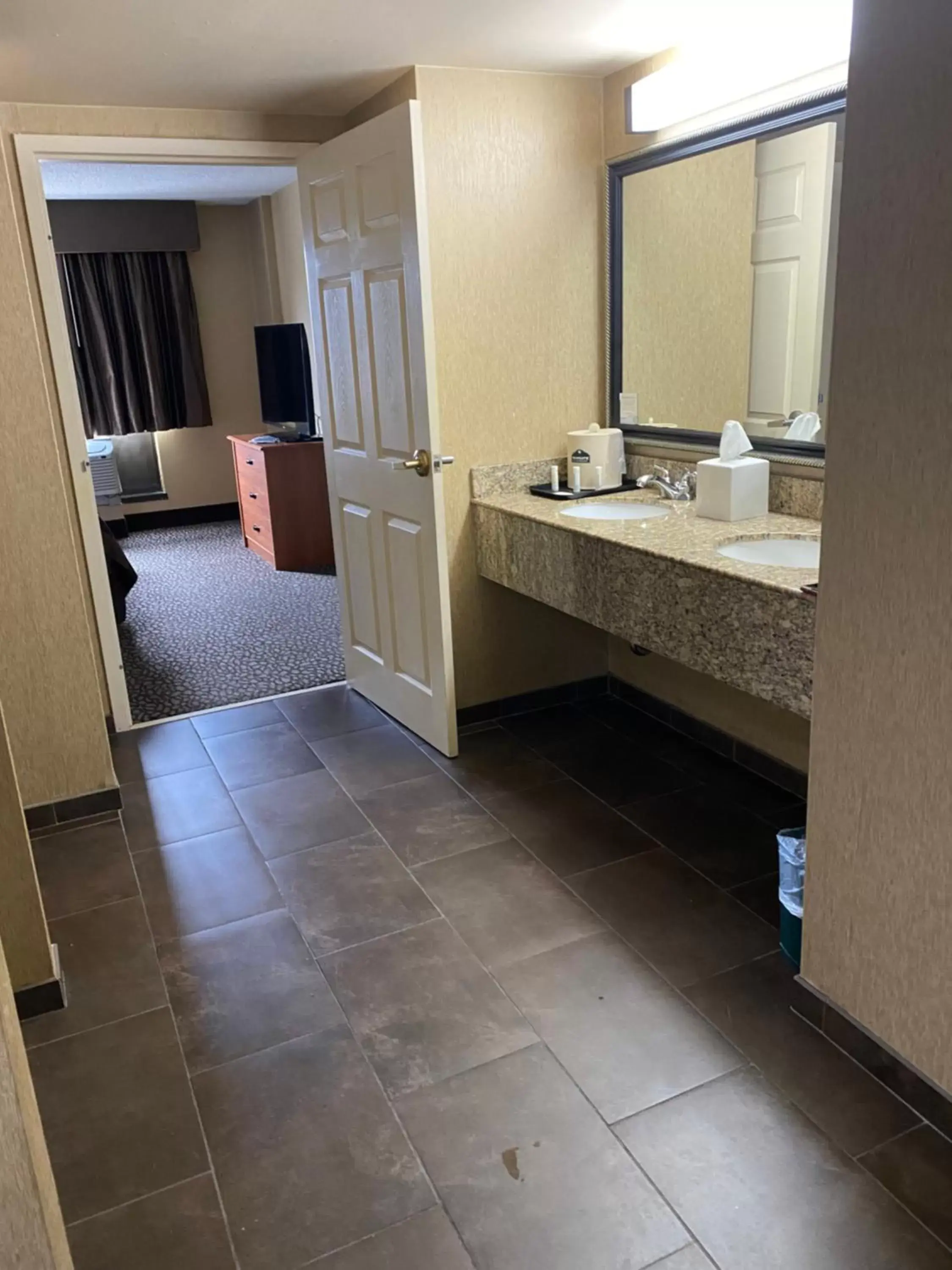 Bathroom in Wingate by Wyndham Little Rock