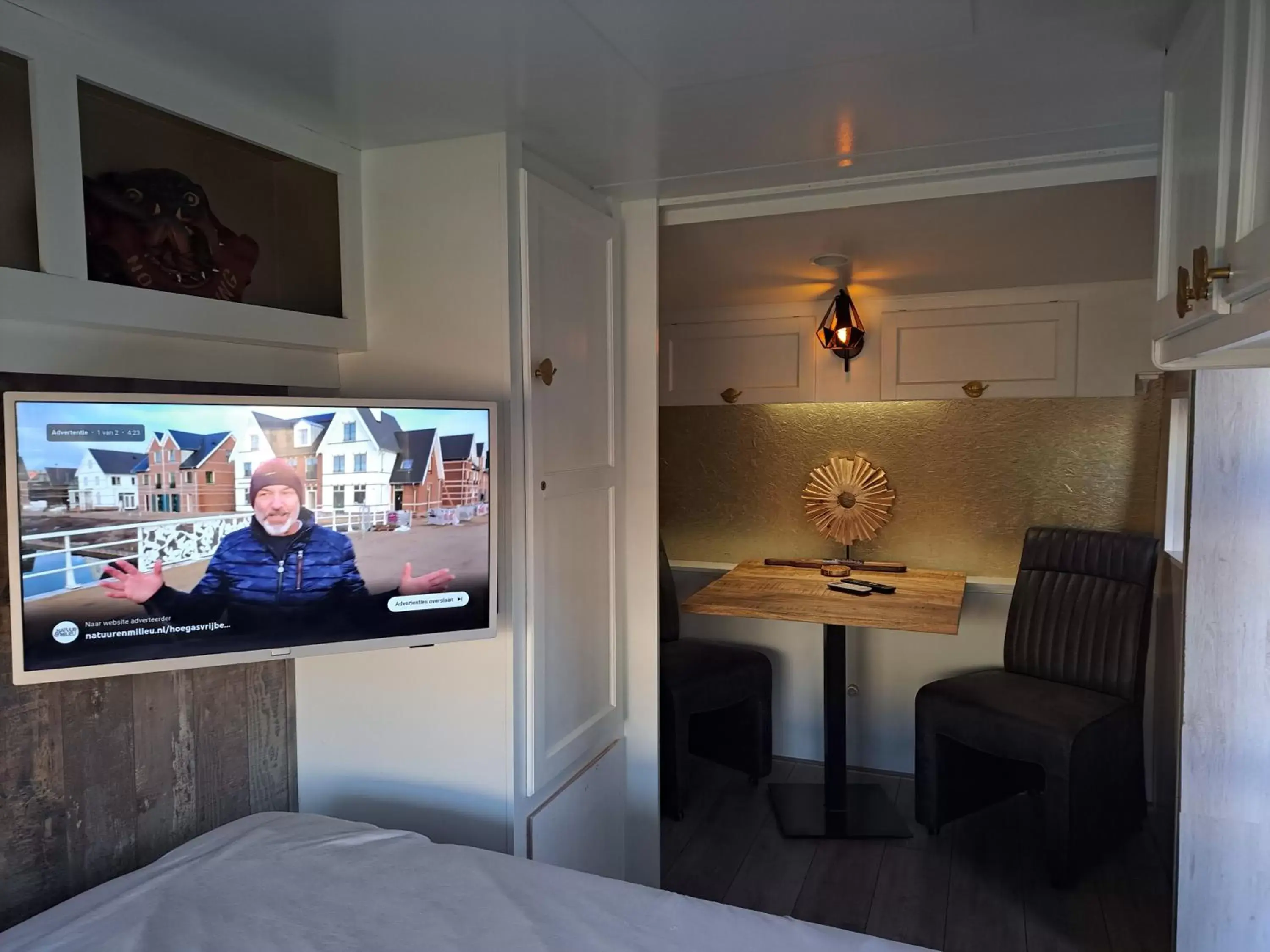 Photo of the whole room, TV/Entertainment Center in bnbheerhugowaard wooden