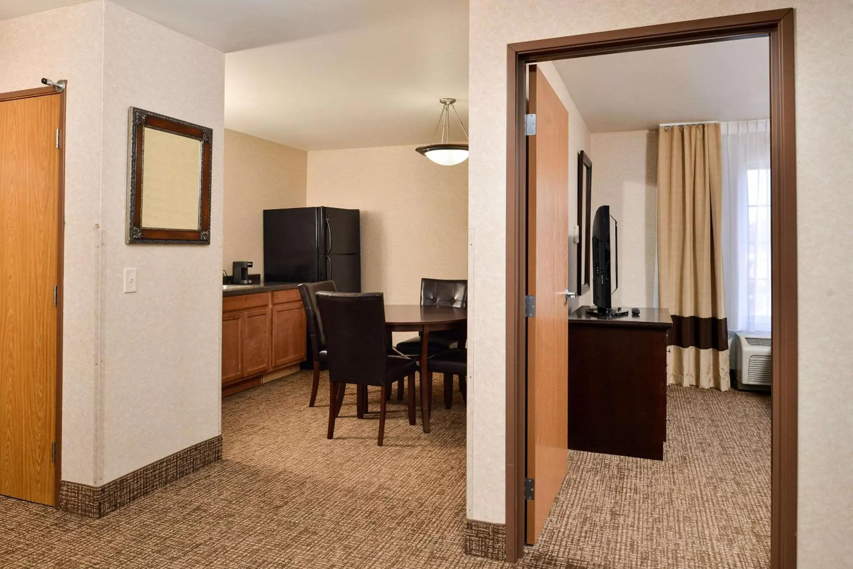 Photo of the whole room, TV/Entertainment Center in Comfort Inn & Suites DeForest