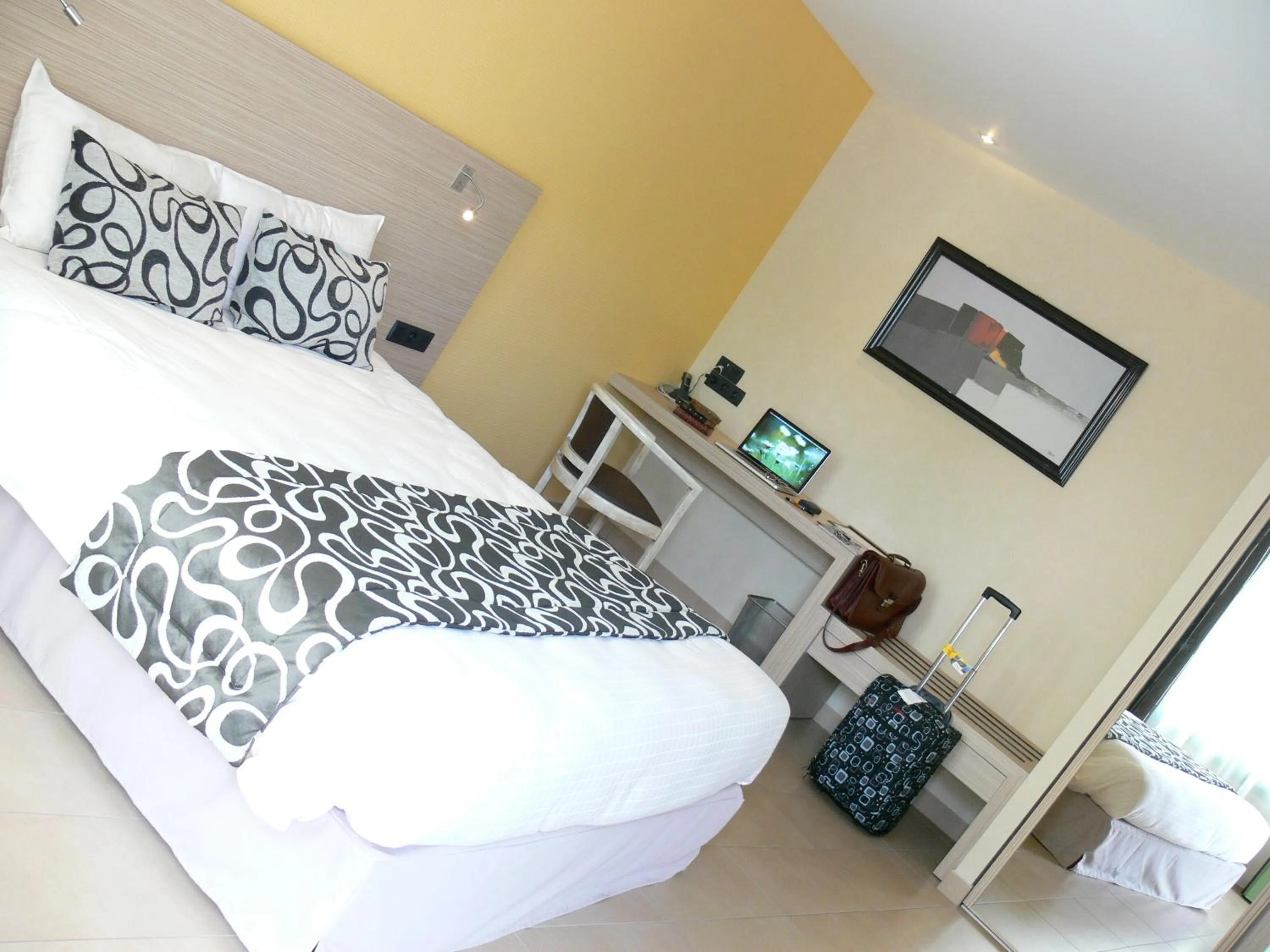 Bed in Logis Hotels Le Champalud Restaurant La Citadelle