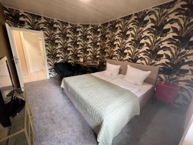 Bed in Hotel Rehkitz