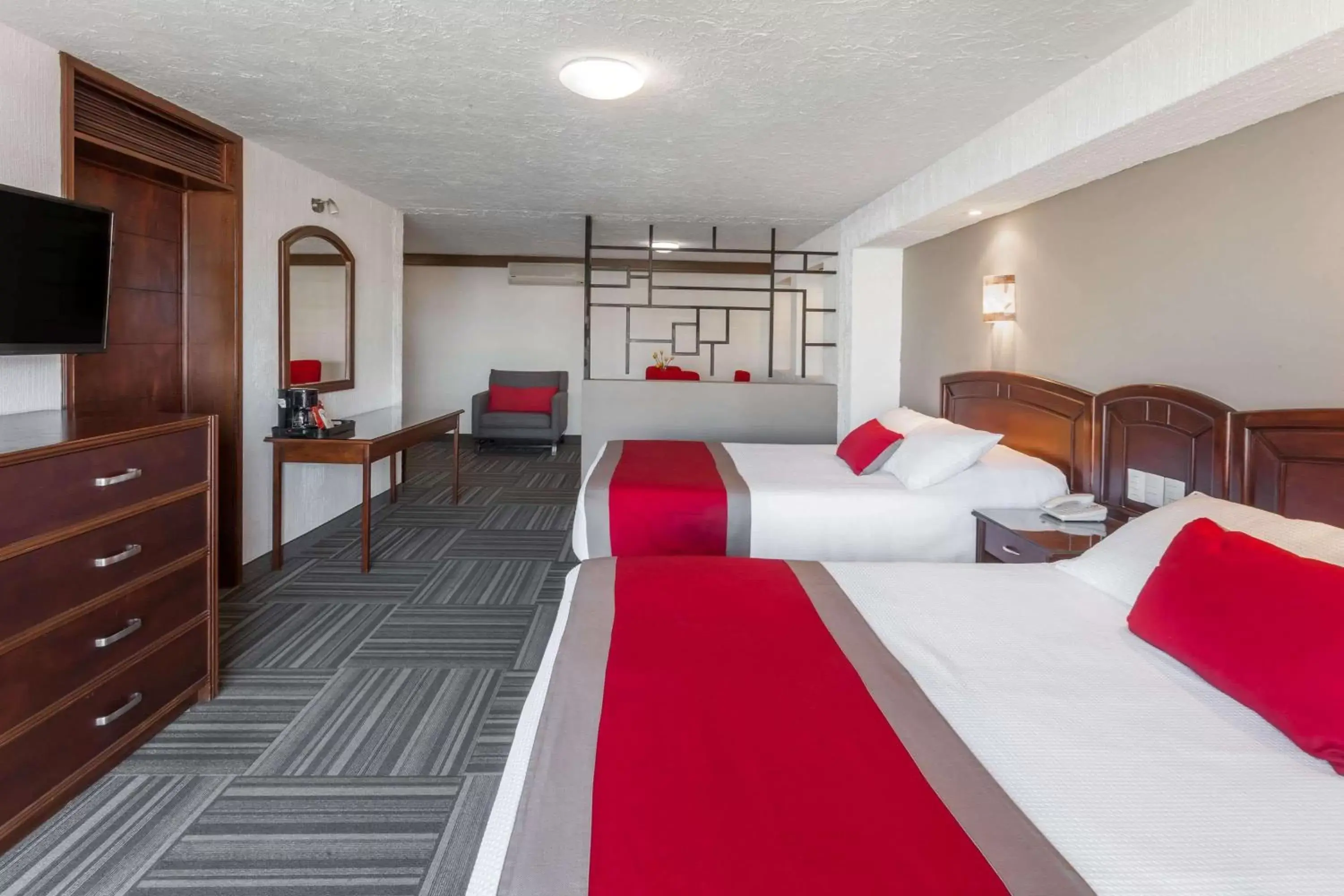 Photo of the whole room, Bed in Ramada Plaza by Wyndham Leon