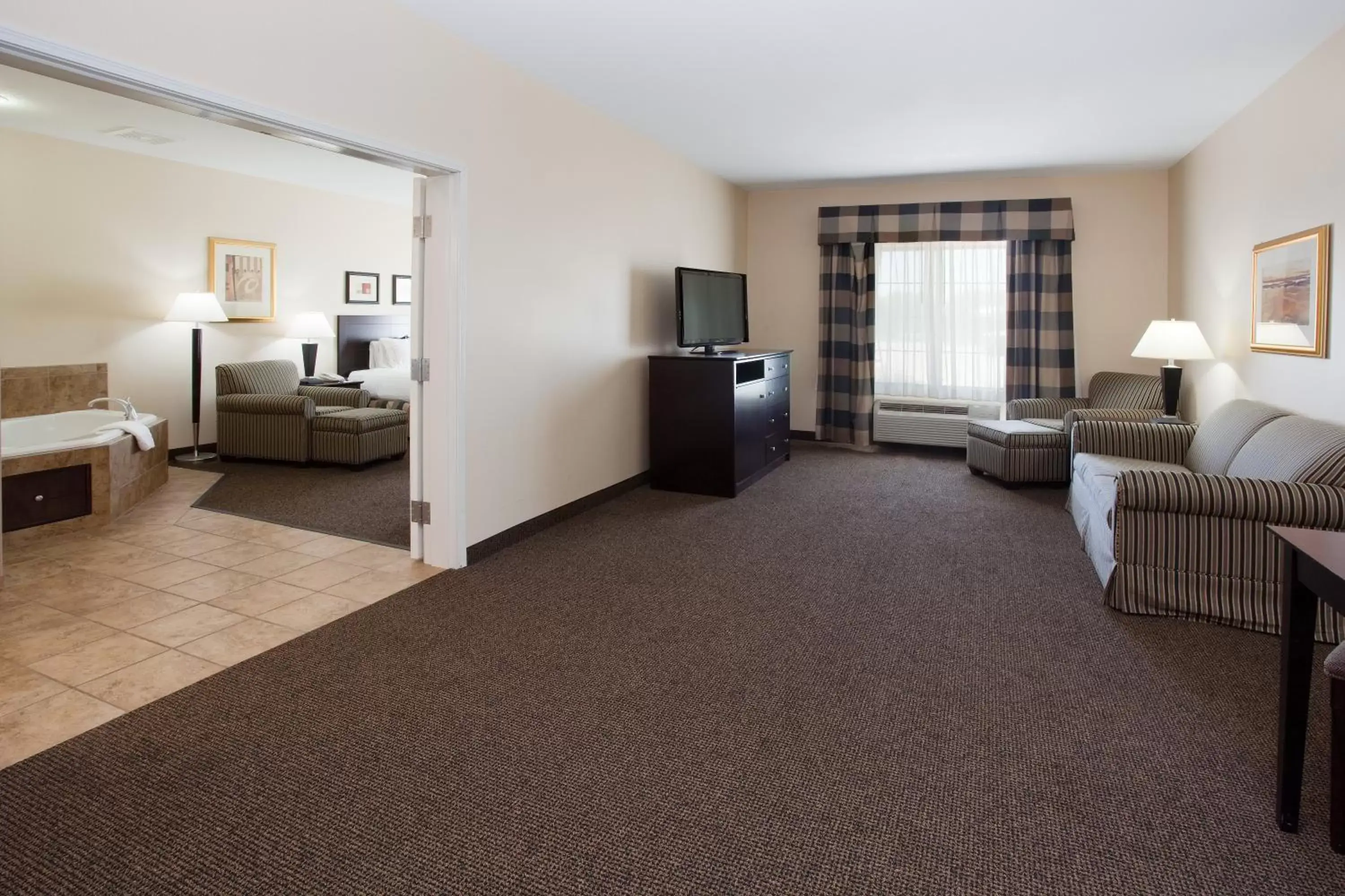 Photo of the whole room, Seating Area in Holiday Inn Express Hotel & Suites Fort Collins, an IHG Hotel