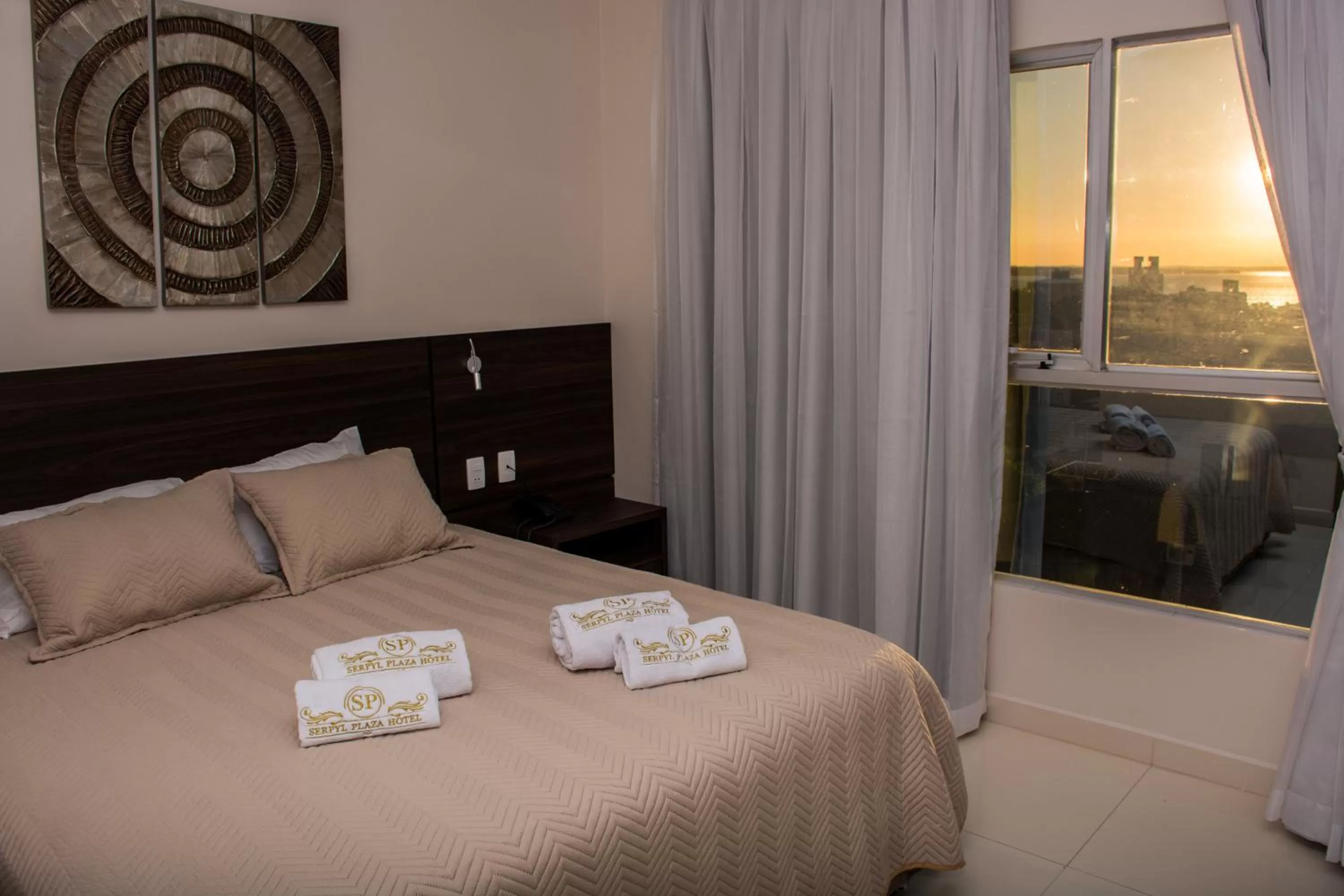 Bed in SERPYL Plaza Hotel