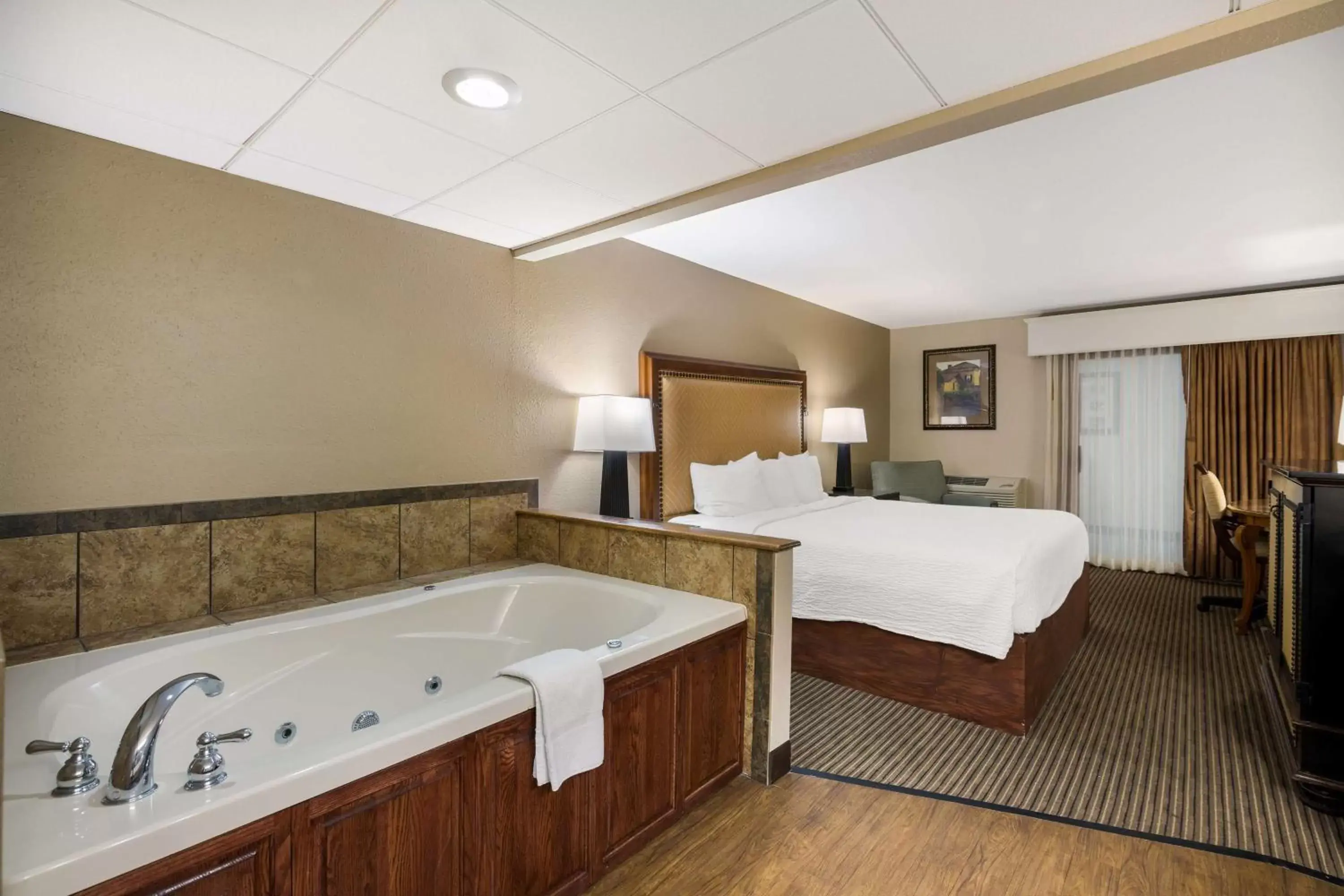 Bedroom, Bathroom in Revel Hotel Minot - SureStay Collection by Best Western