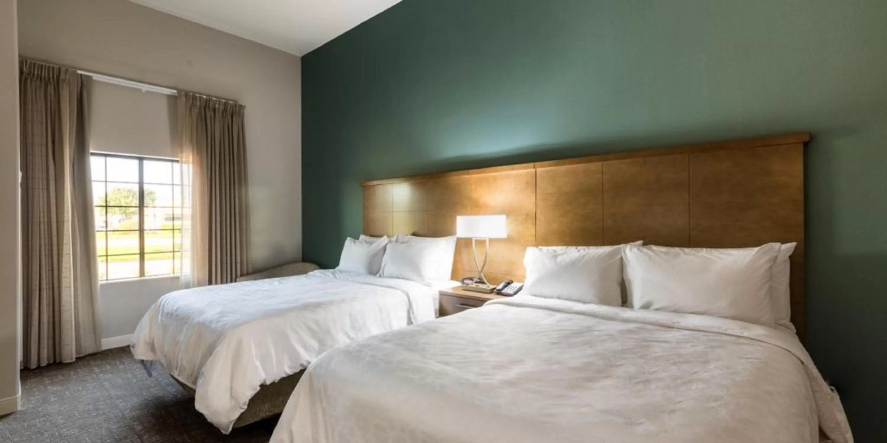 Photo of the whole room, Bed in Staybridge Suites Houston East - Baytown by IHG