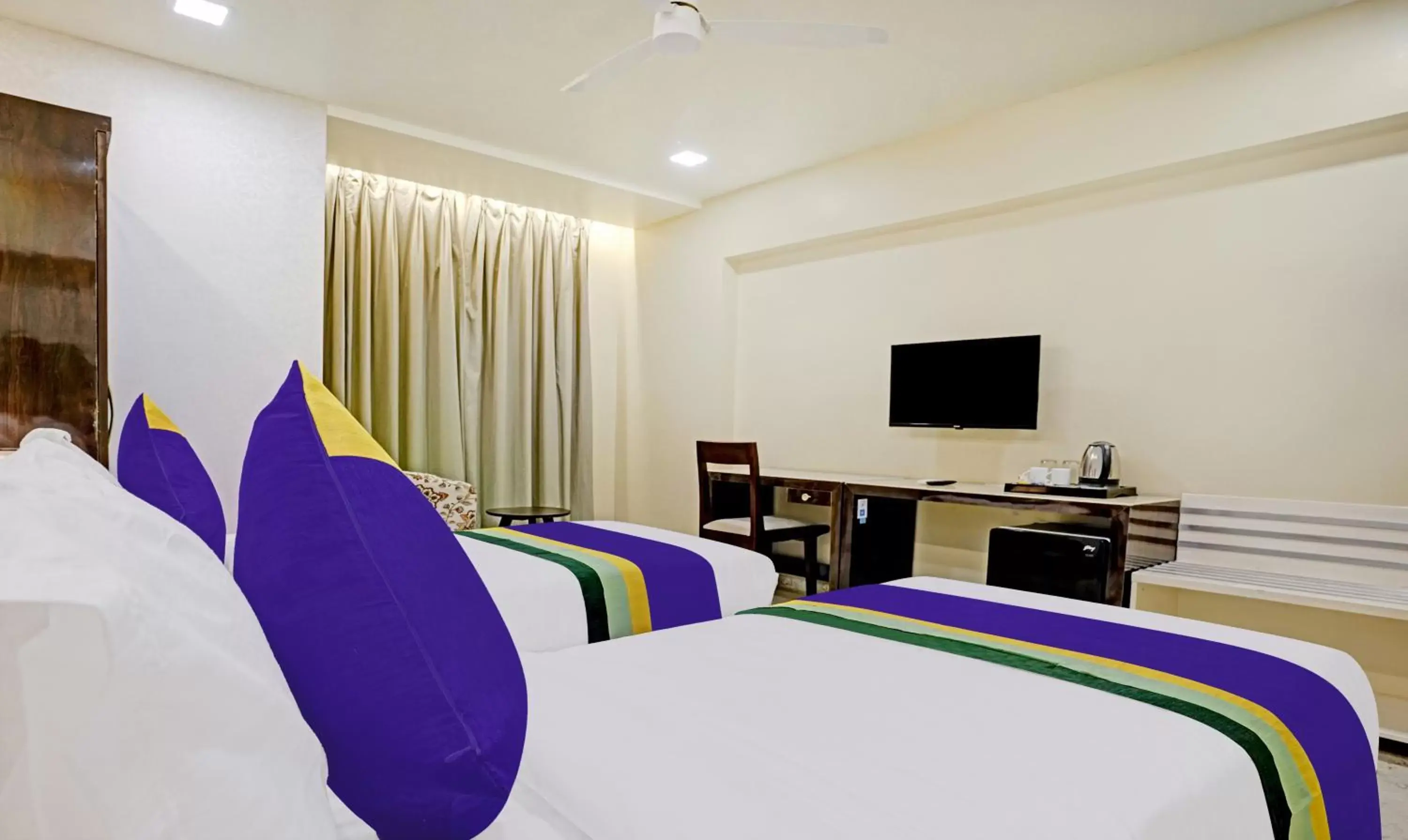 Bedroom, Bed in Treebo Premium Golden Bliss Trimurti Nagar Square Bedroom, Bed in Treebo Premium Golden Bliss Trimurti Nagar Square