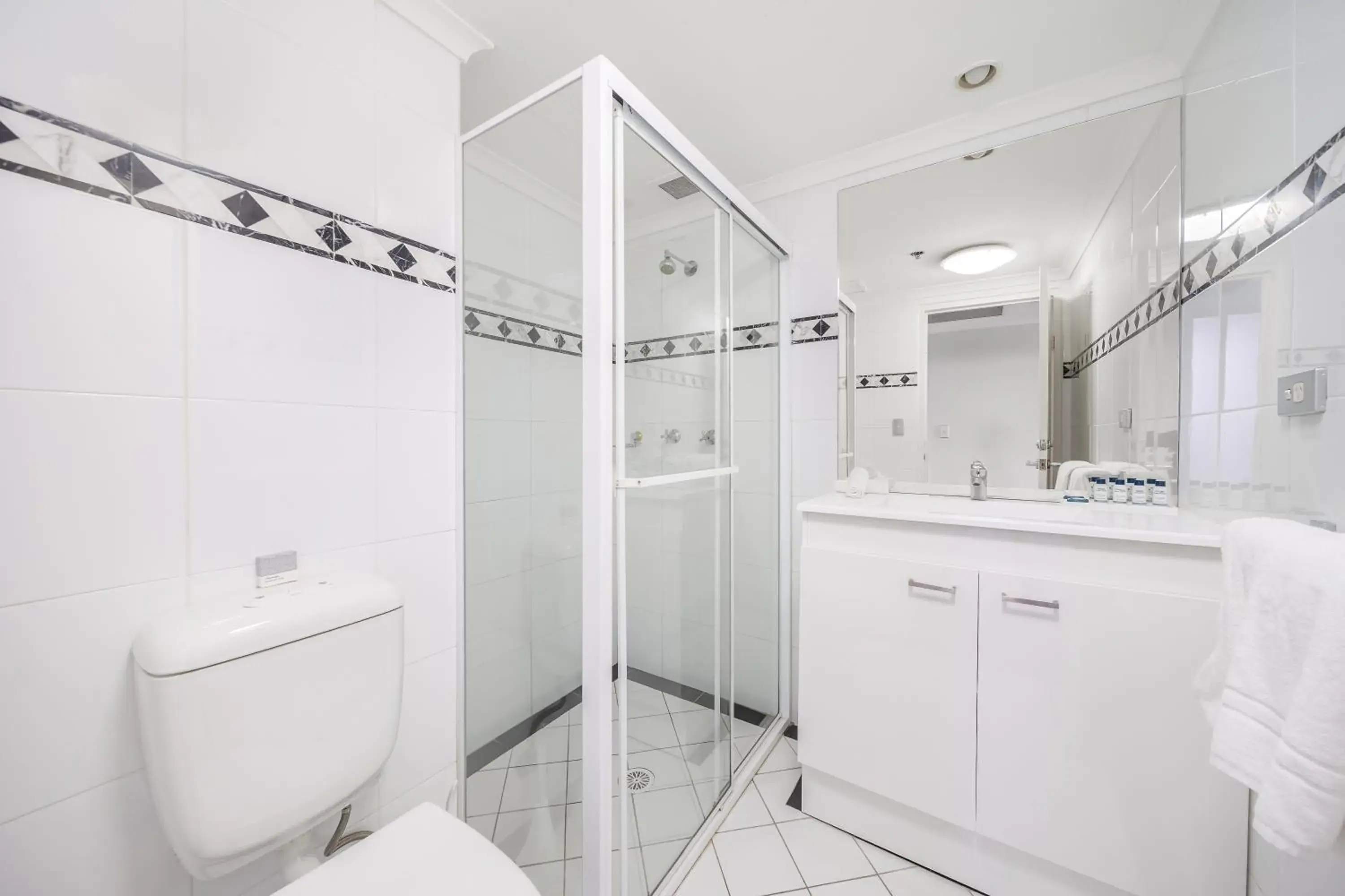 Toilet, Bathroom in Oaks Sydney Castlereagh Suites