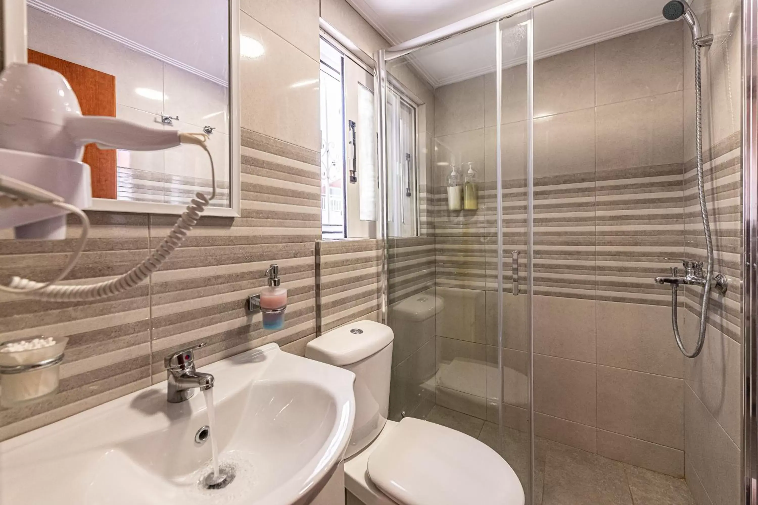 Bathroom in Apartments Tina FREE transfer from-to the airport