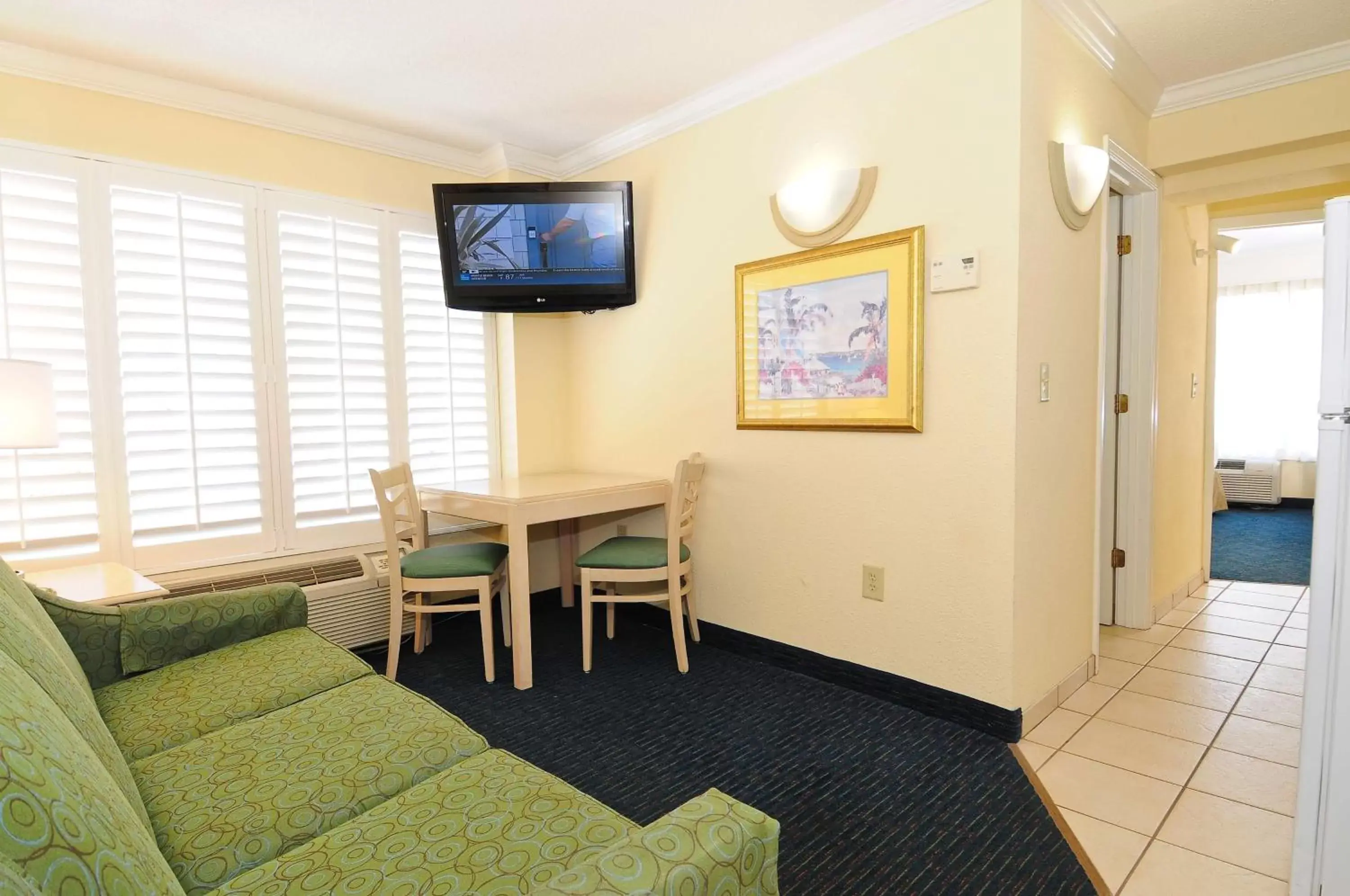 Photo of the whole room, TV/Entertainment Center in The Sandbar Hotel, Trademark Collection by Wyndham