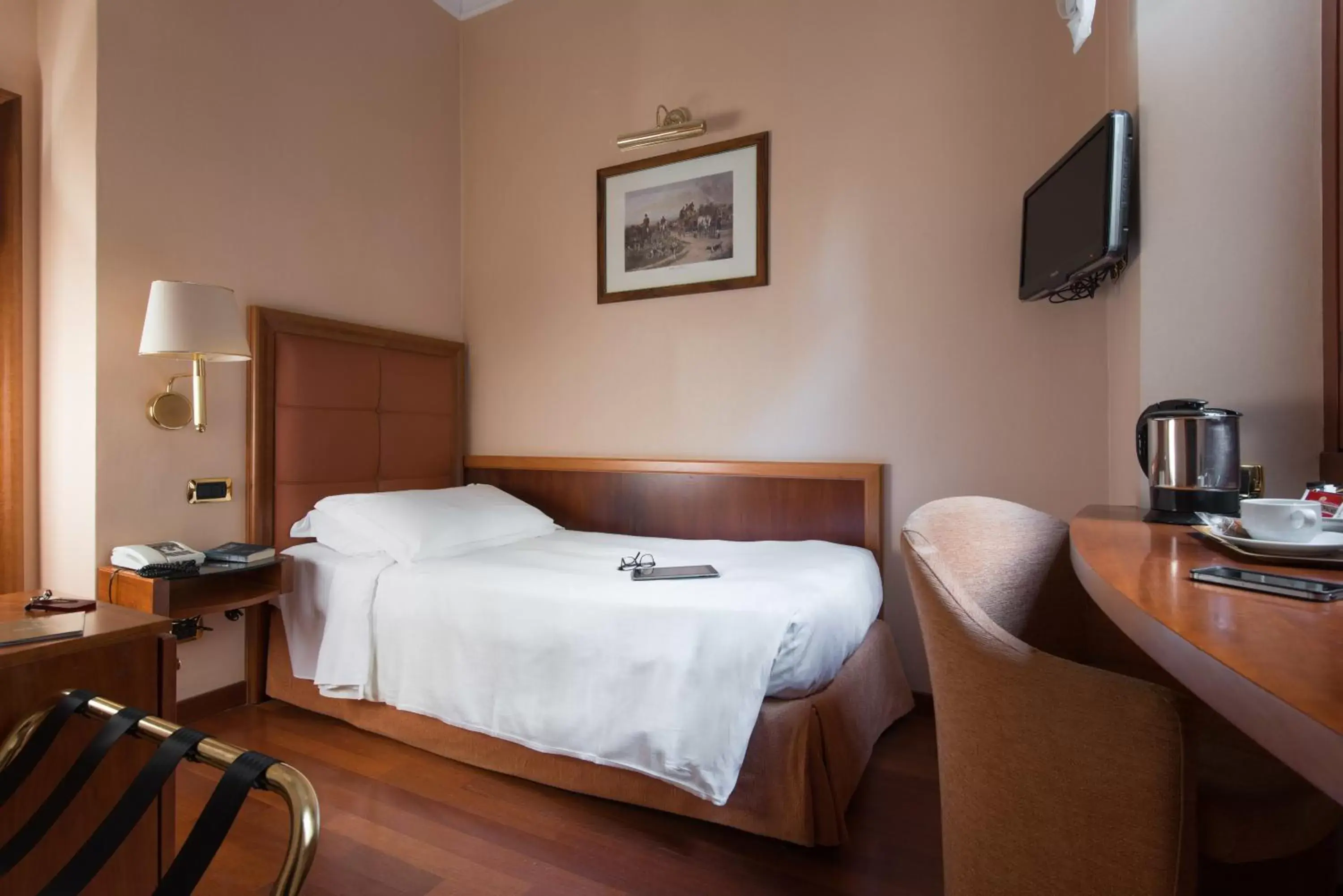 Bed in Hotel Berna