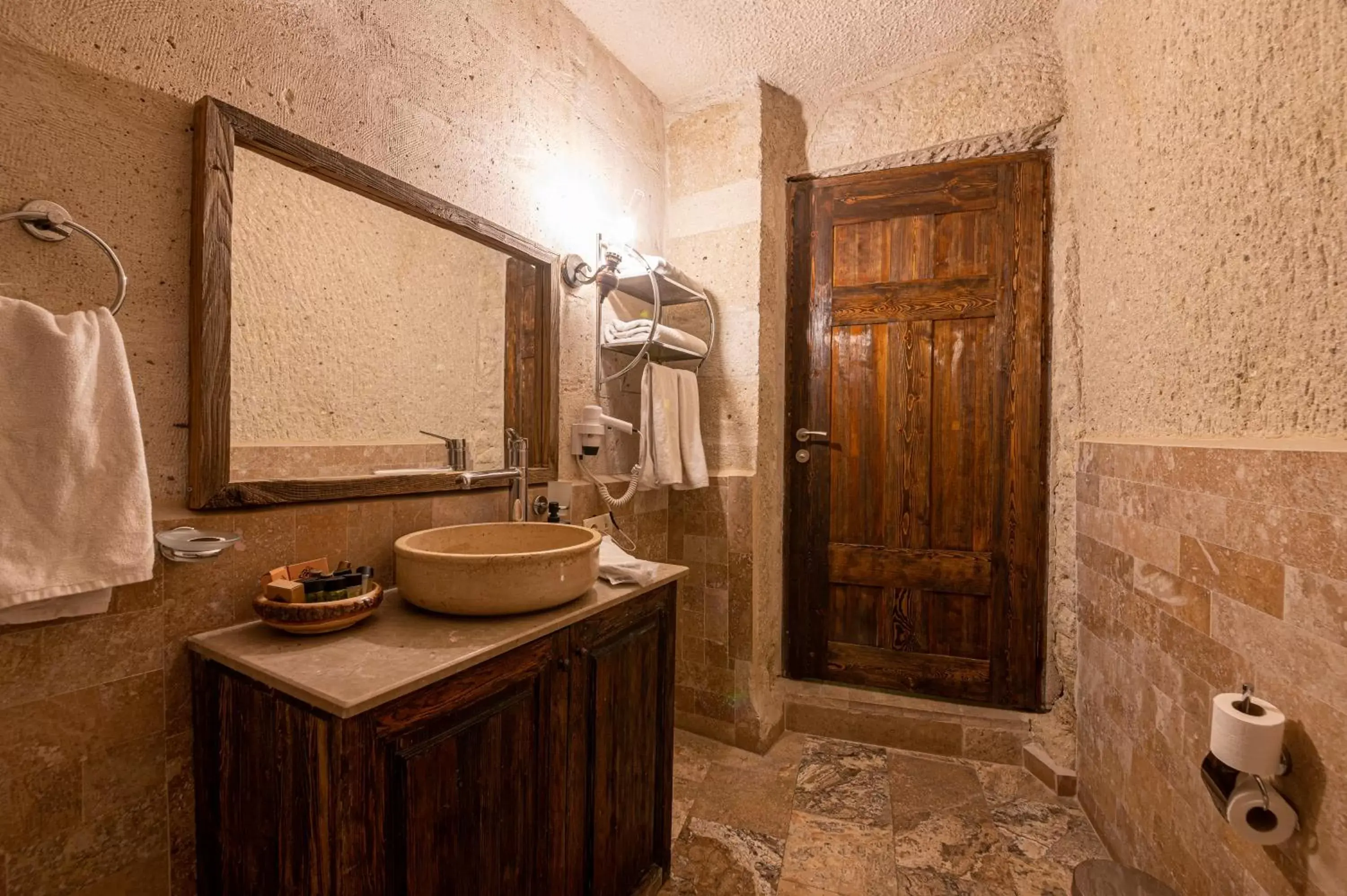 towels, Bathroom in Hidden Cave Hotel