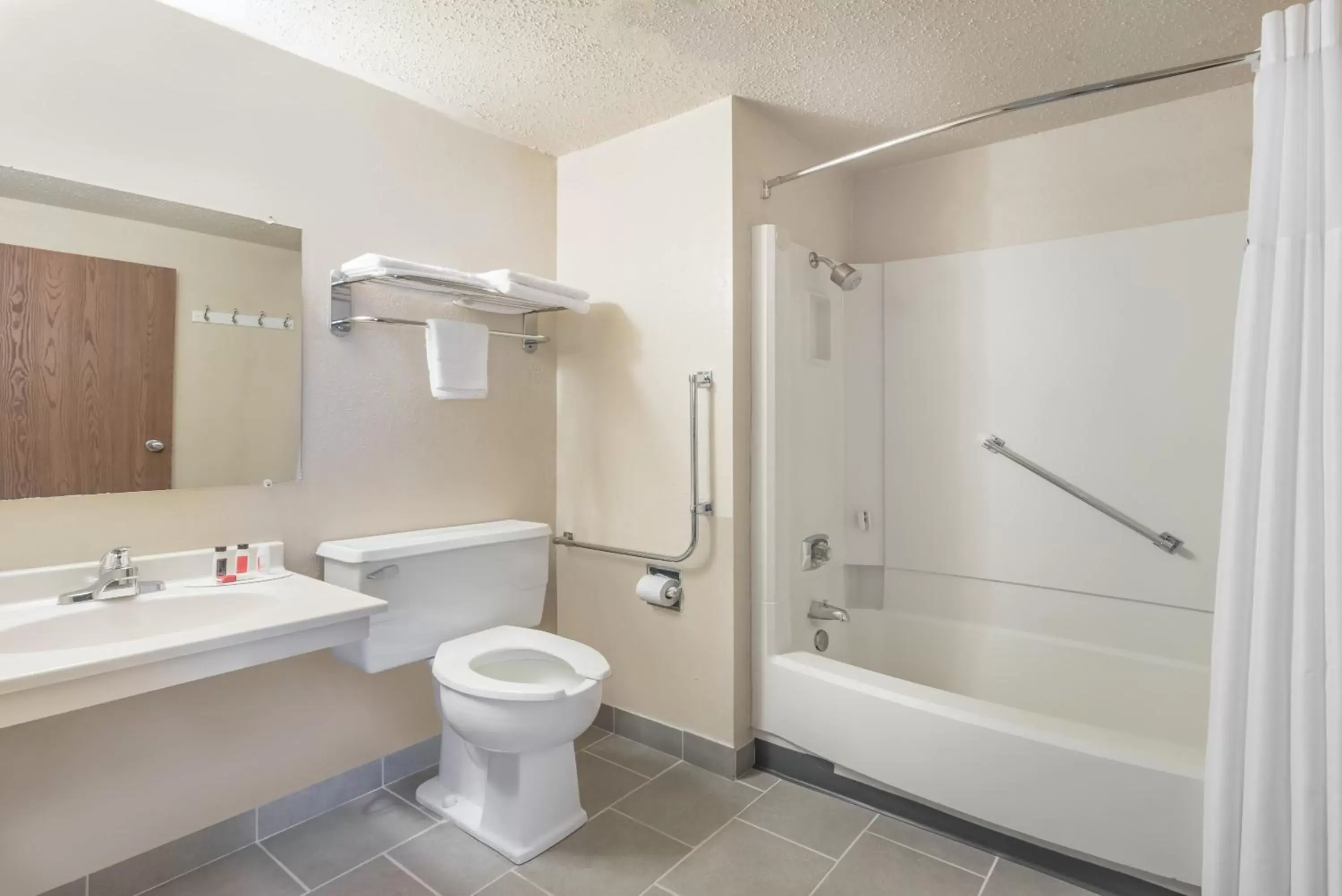 Bathroom in Super 8 by Wyndham Devils Lake