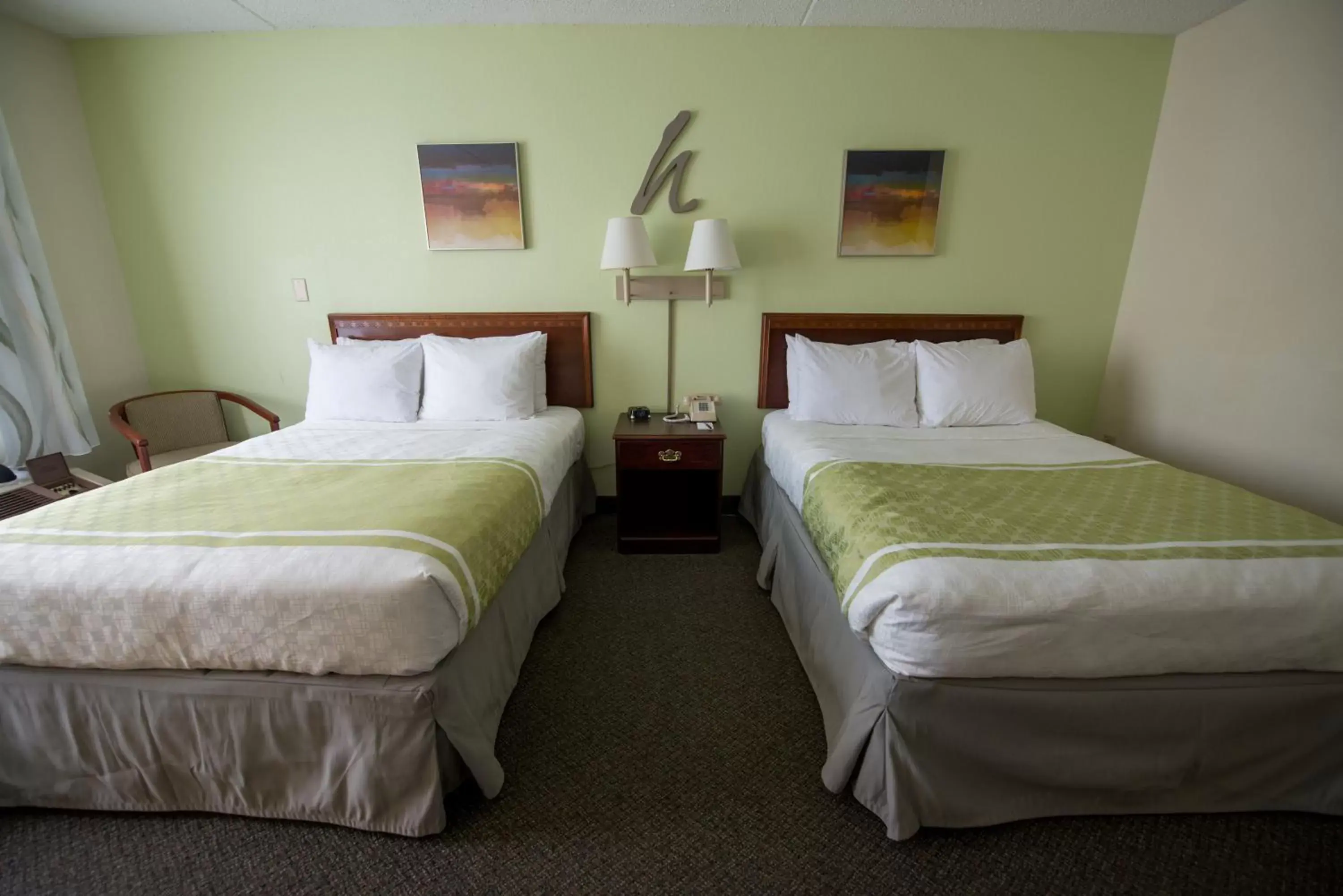 Bed in Hope Hotel and Richard C. Holbrooke Conference Center