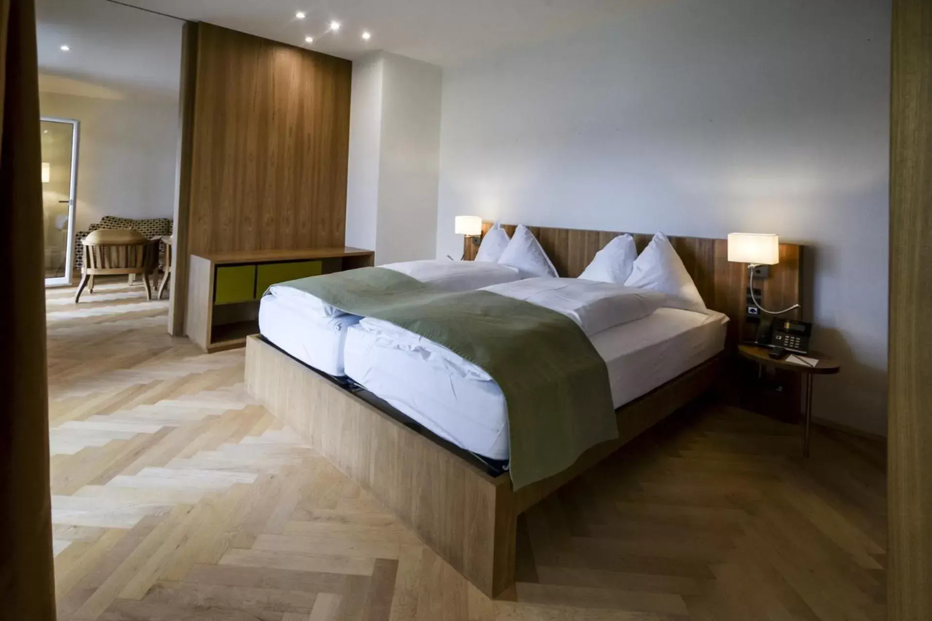 Photo of the whole room, Bed in Waldhotel & SPA Davos - for body & soul