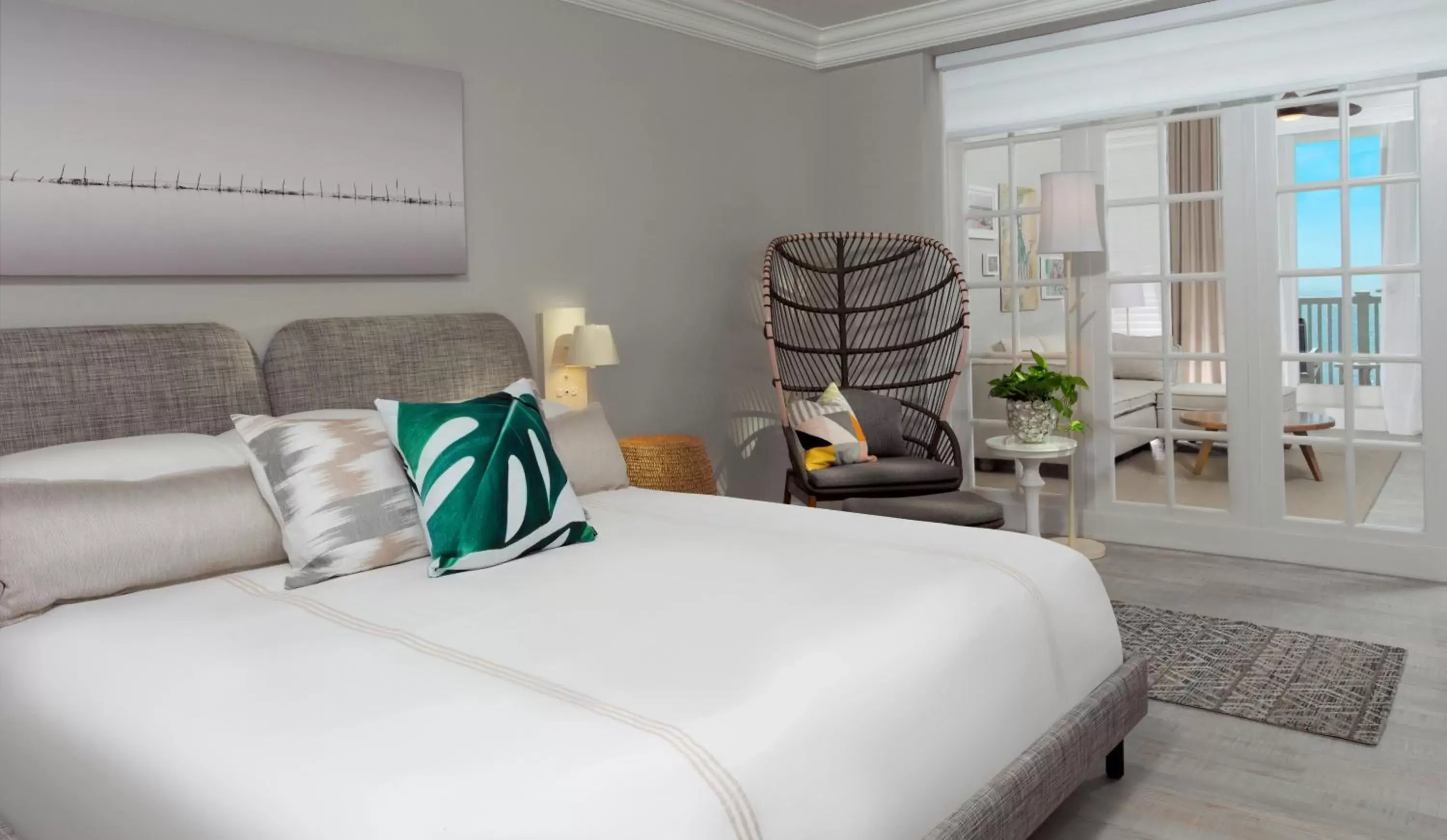 Bed in Pelican Grand Beach Resort, a Noble House Resort