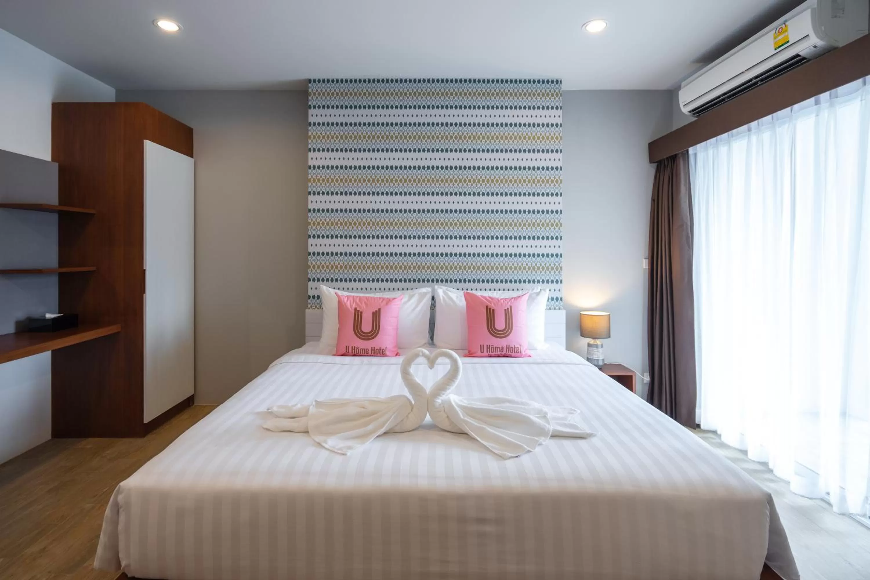 Bed in U- Homehotel Nakhonpanom