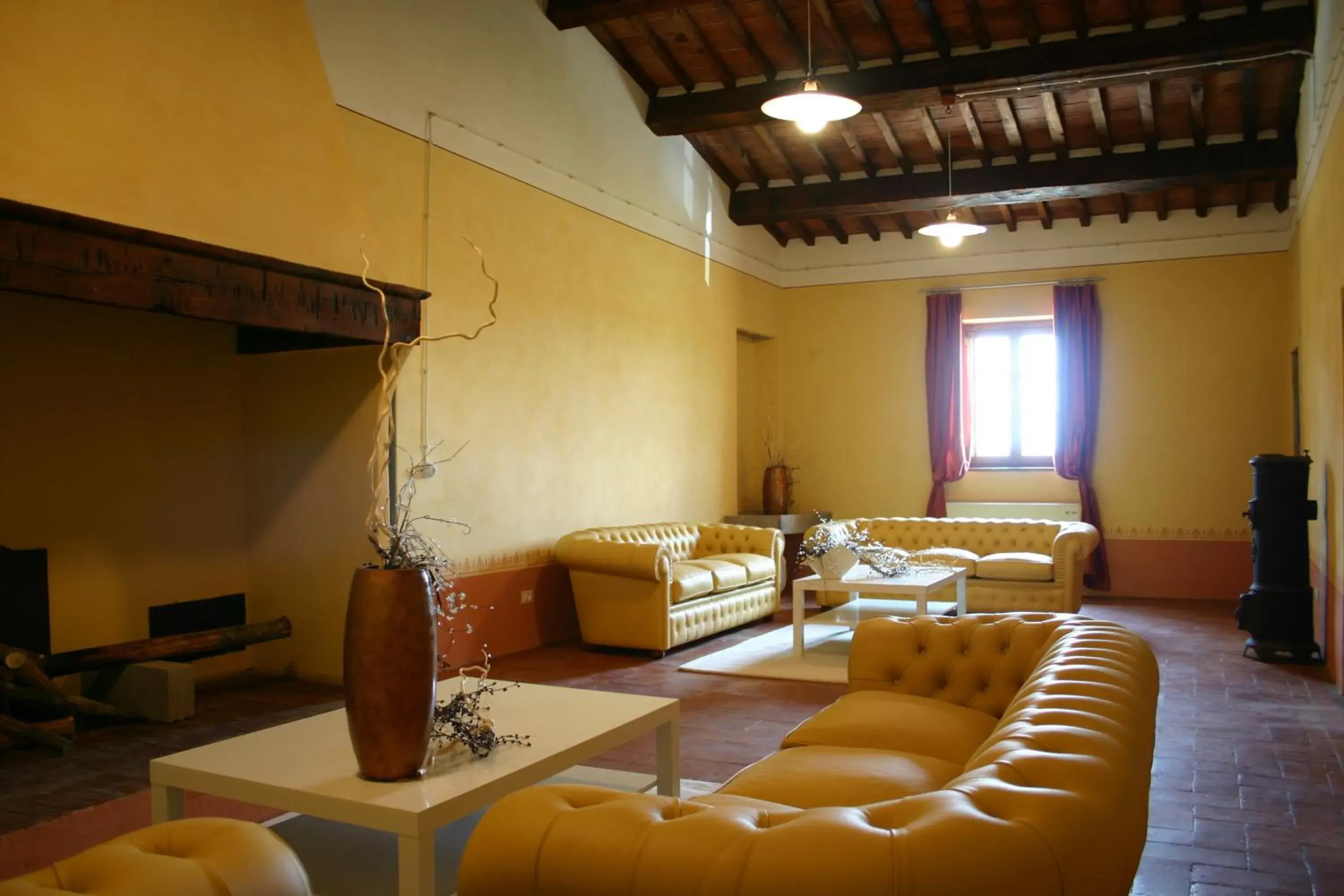 Communal lounge/ TV room, Seating Area in Hotel Le Capanne