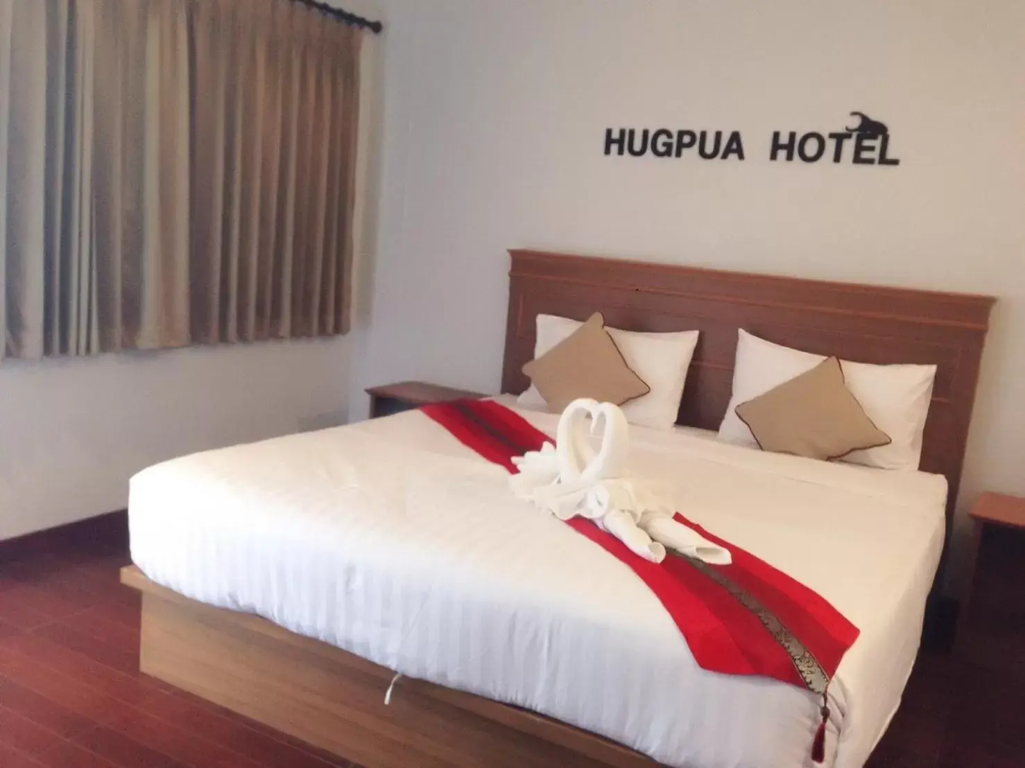 Bed in Hugpua Hotel