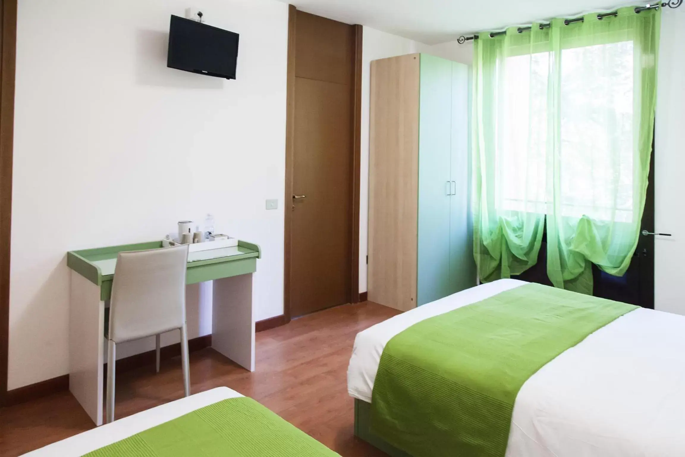 Triple Room with Garden View in I Salici Triple Room with Garden View in I Salici