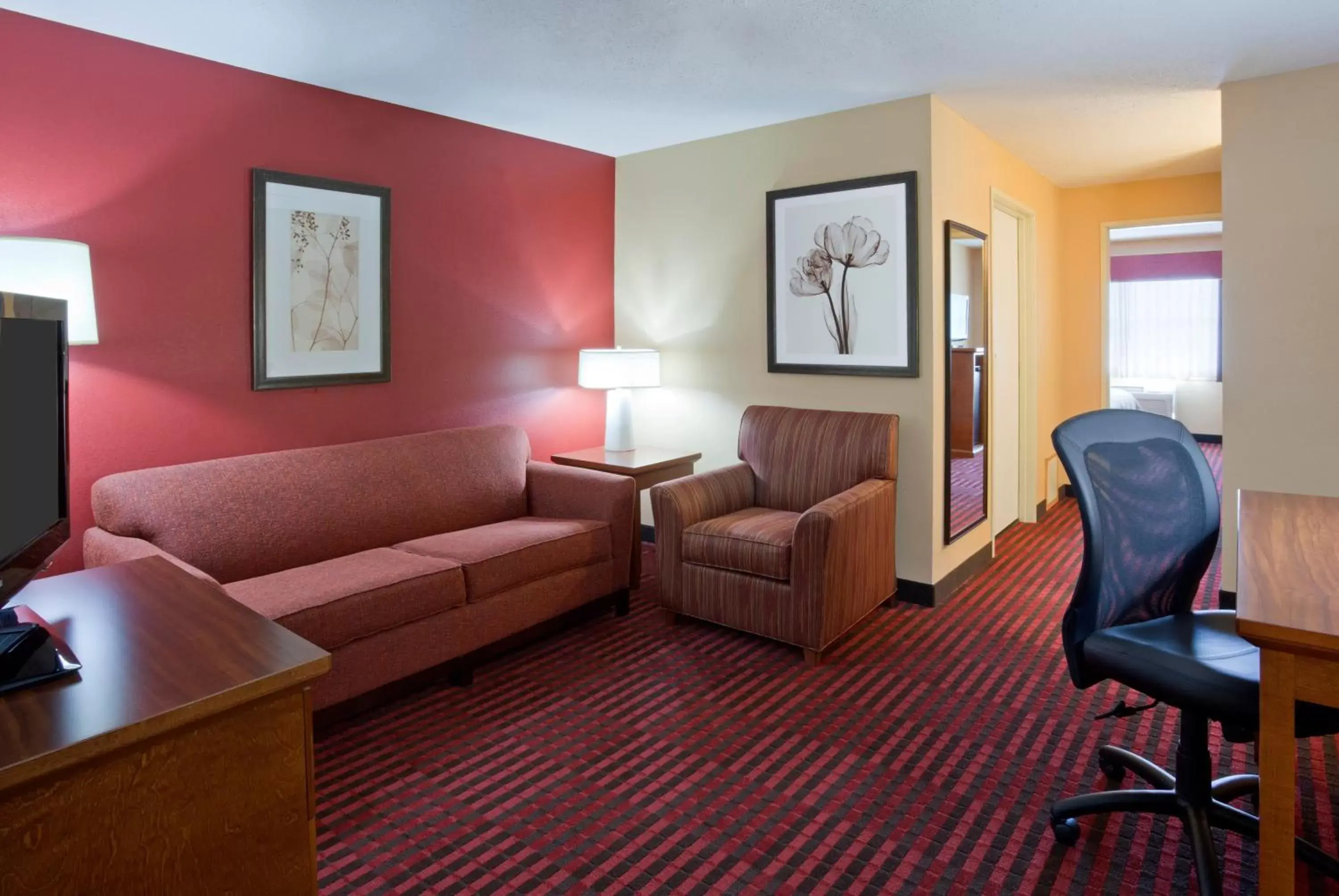 Living room, Seating Area in GrandStay Hotel & Suites - Stillwater