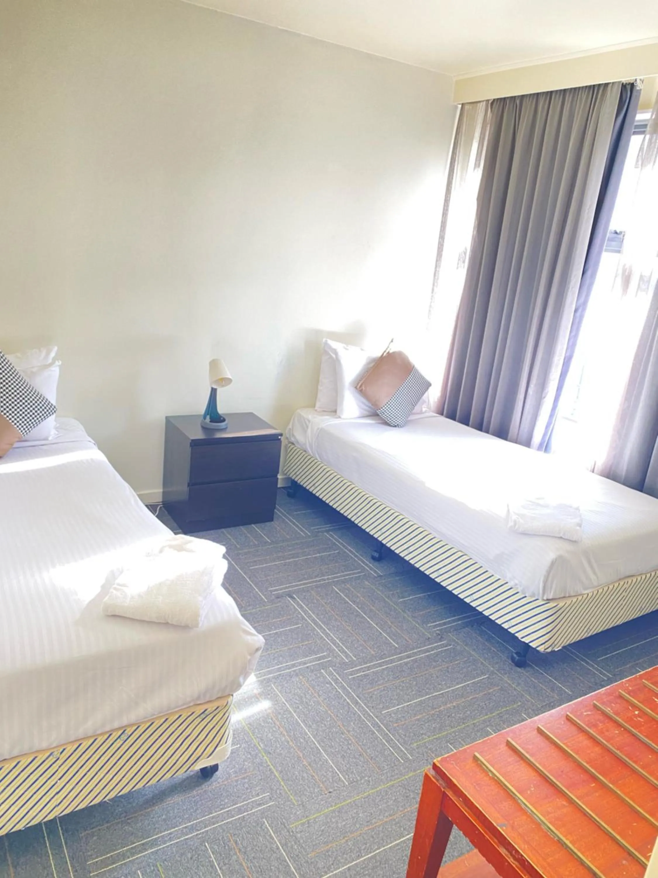 Bedroom, Bed in City Edge East Melbourne Apartment Hotel