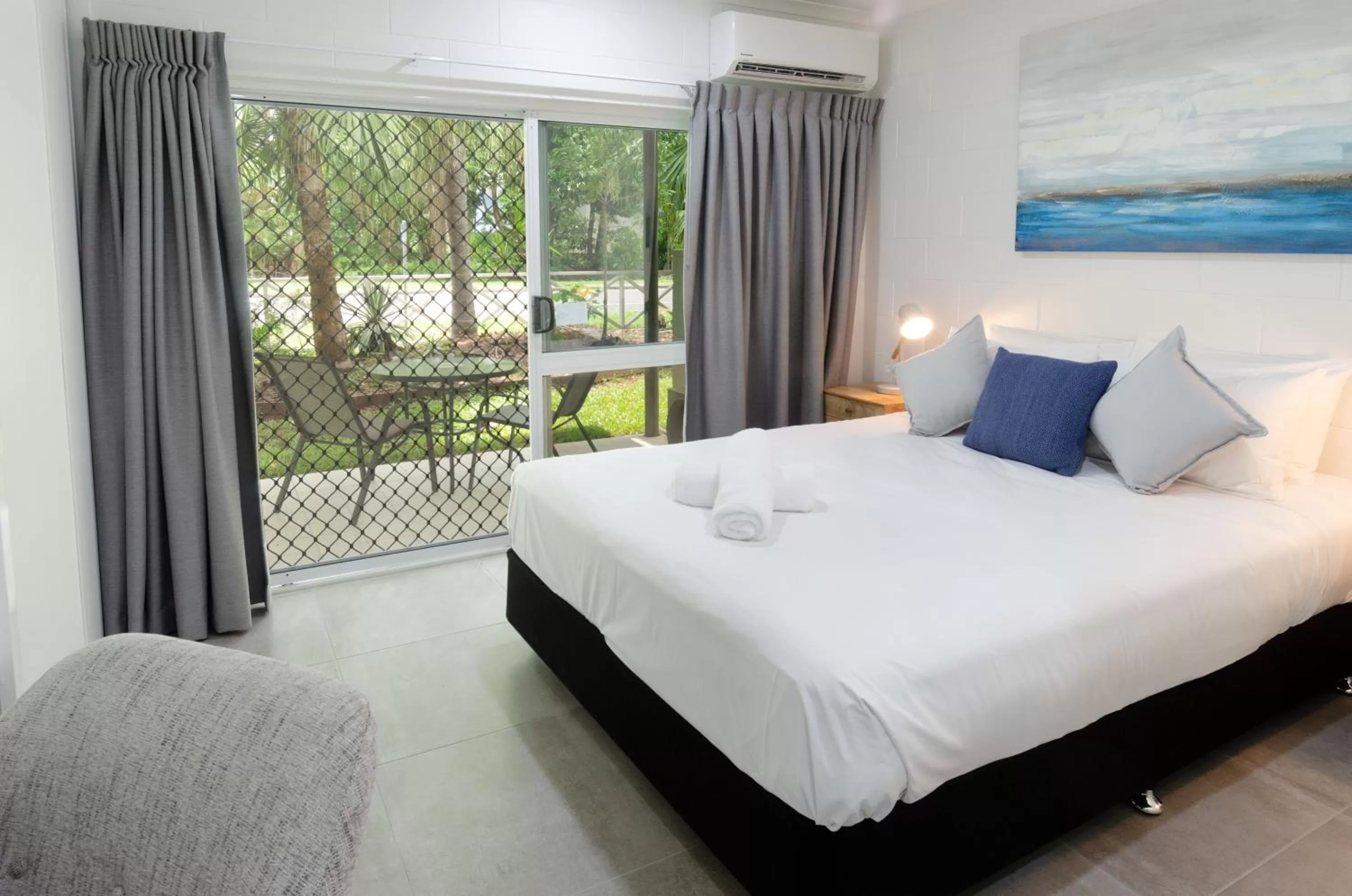 Bed in TiTree Village Holiday Apartments