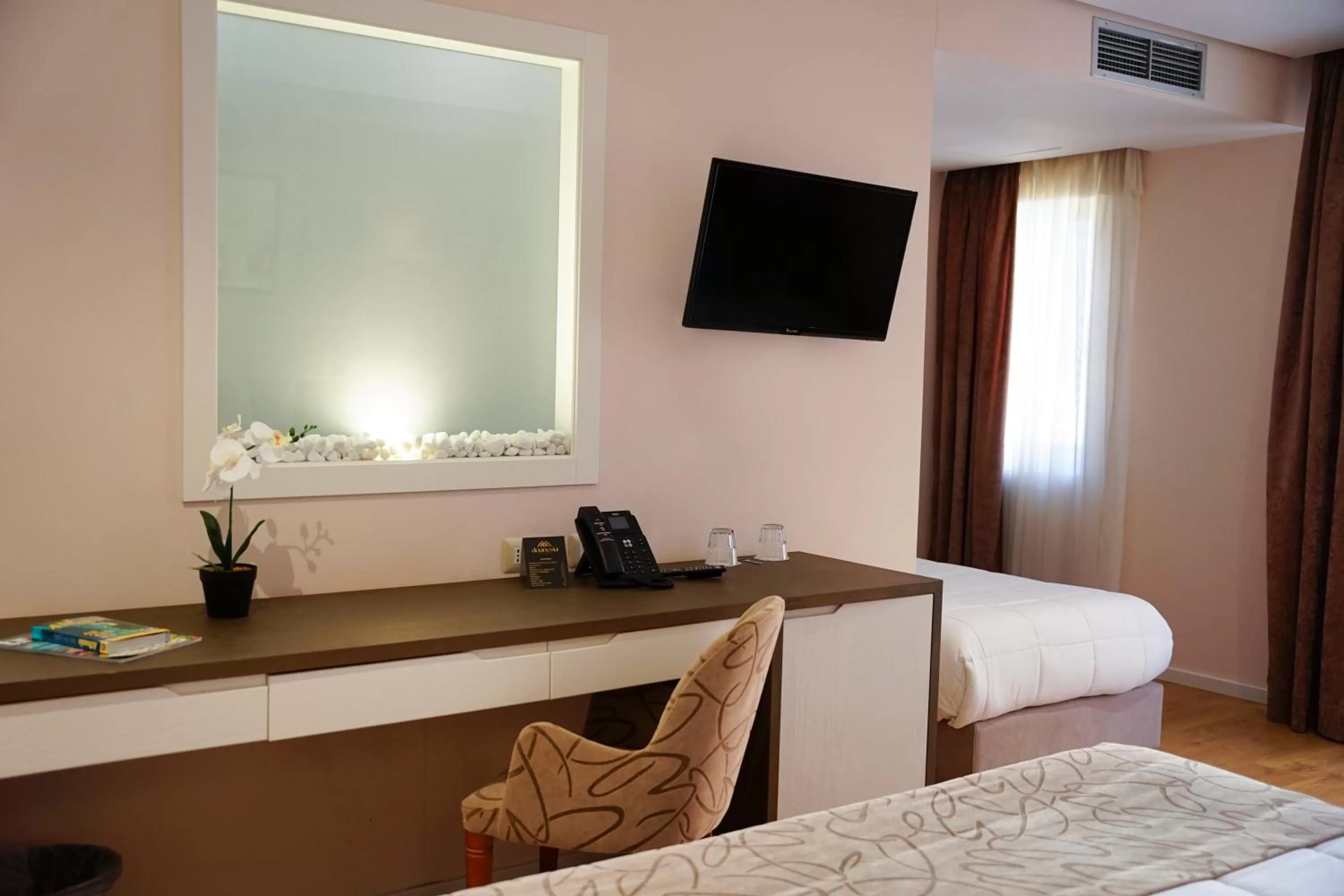 TV and multimedia, Bed in Doanesia Premium Hotel & Spa